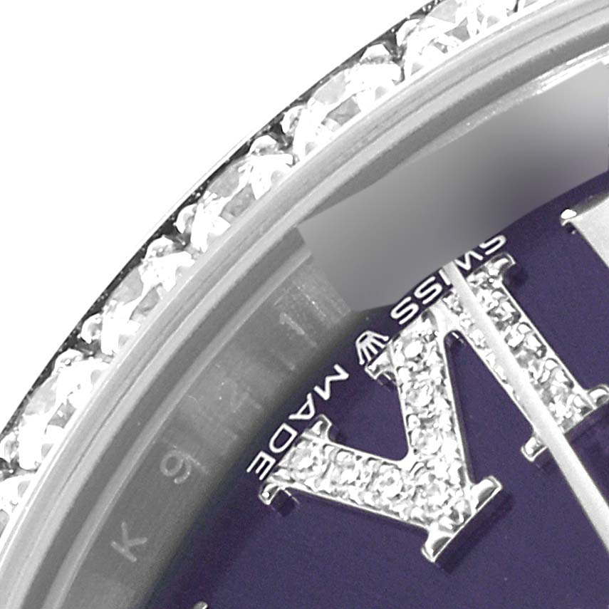 This close-up image showcases the bejeweled bezel and a portion of the dial on the Mid-Size Rolex watch.