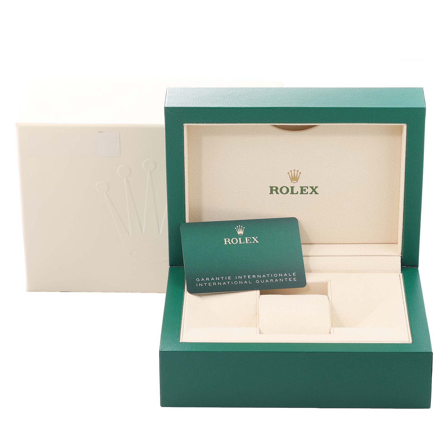 This image shows the opened box and international guarantee card for a mid-size Rolex watch.