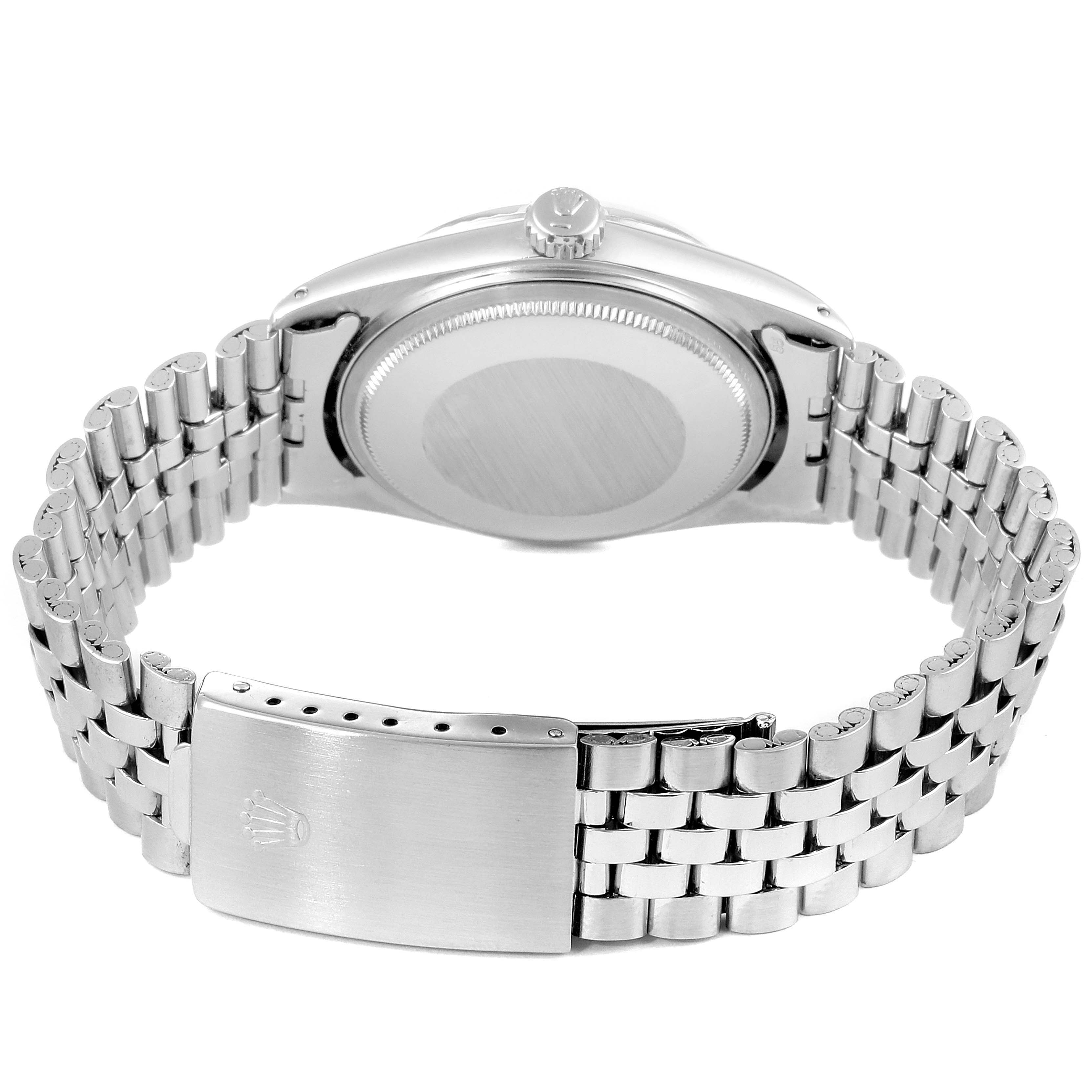 The image shows the back view of the Rolex Vintage Collection 1601 Men's Stainless Steel Silver Dial 1601 Men's Stainless Steel Silver Dial watch, featuring its case back, crown, and bracelet with a clasp.