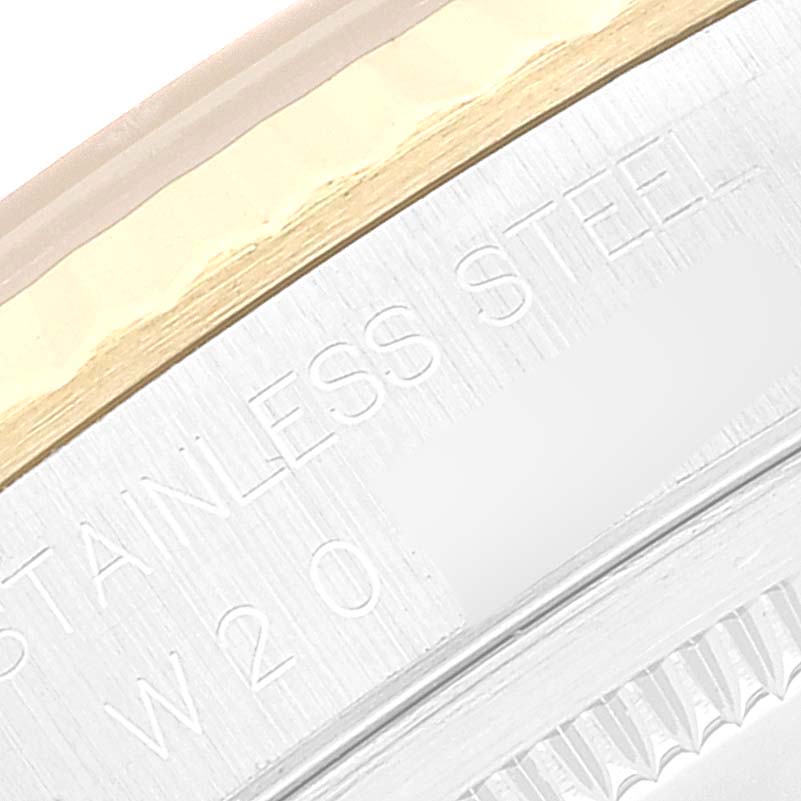 This close-up shows the stainless steel part and the edge detailing of a Rolex Datejust 16233 Men's Steel and Gold (two tone) Champagne Dial 16233 Men's Steel and Gold (two tone) Champagne Dial watch.