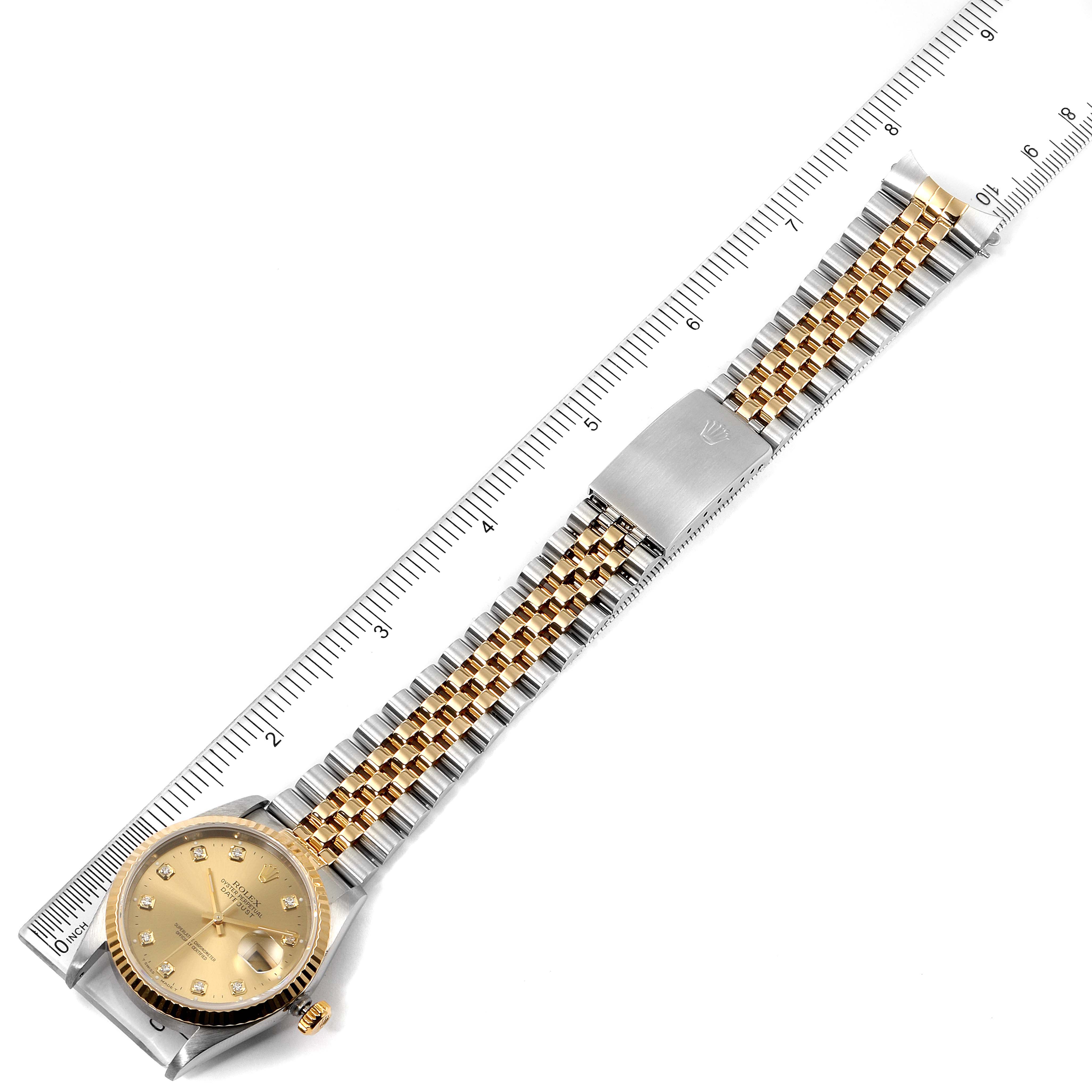 The image shows an overhead view of a Rolex Datejust 16233 Men's Steel and Gold (two tone) Champagne Dial 16233 Men's Steel and Gold (two tone) Champagne Dial watch, highlighting the gold dial, bezel, bracelet, and clasp.