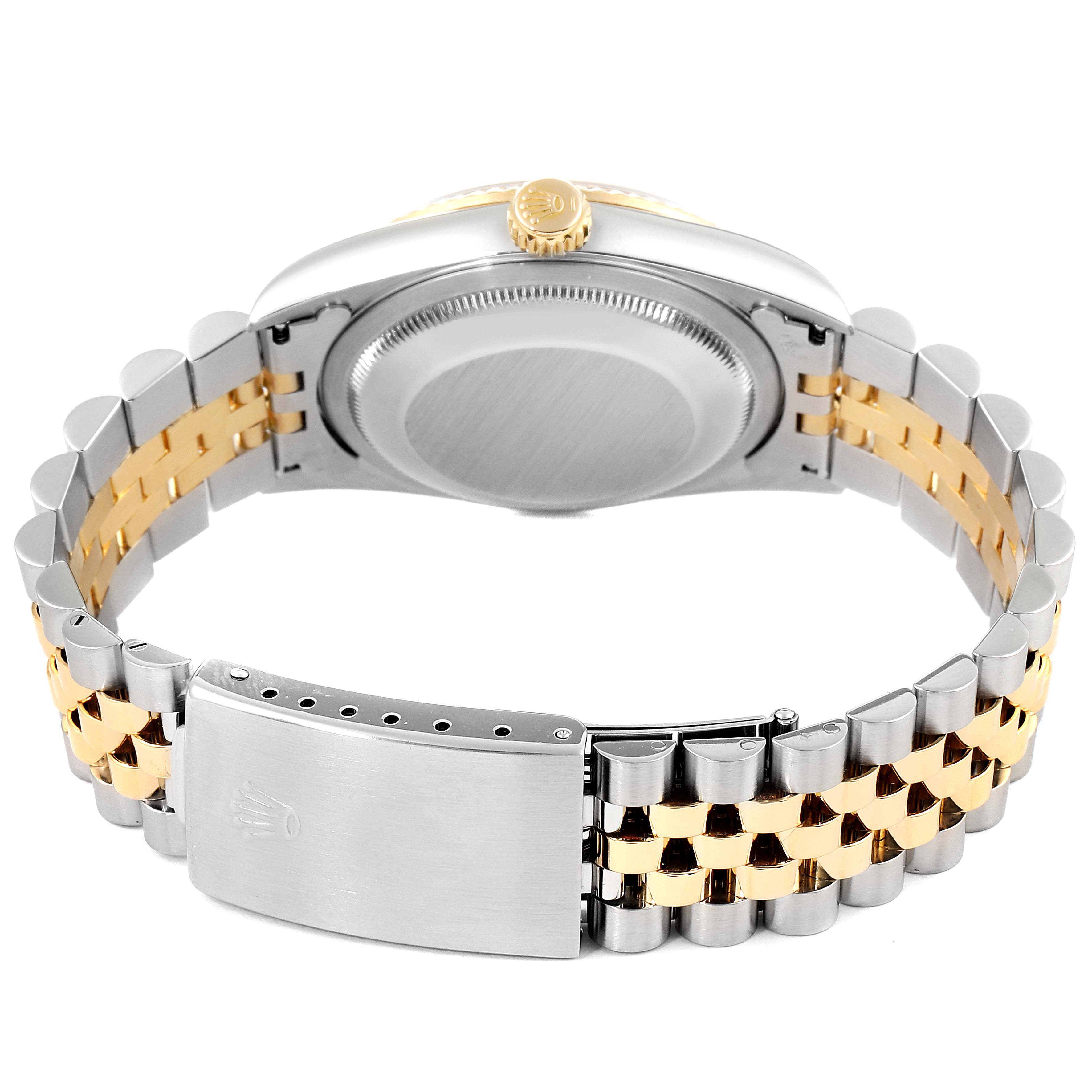 The image shows the back view of a Rolex Datejust 16233 Men's Steel and Gold (two tone) Champagne Dial 16233 Men's Steel and Gold (two tone) Champagne Dial watch, focusing on the case back and two-tone bracelet.