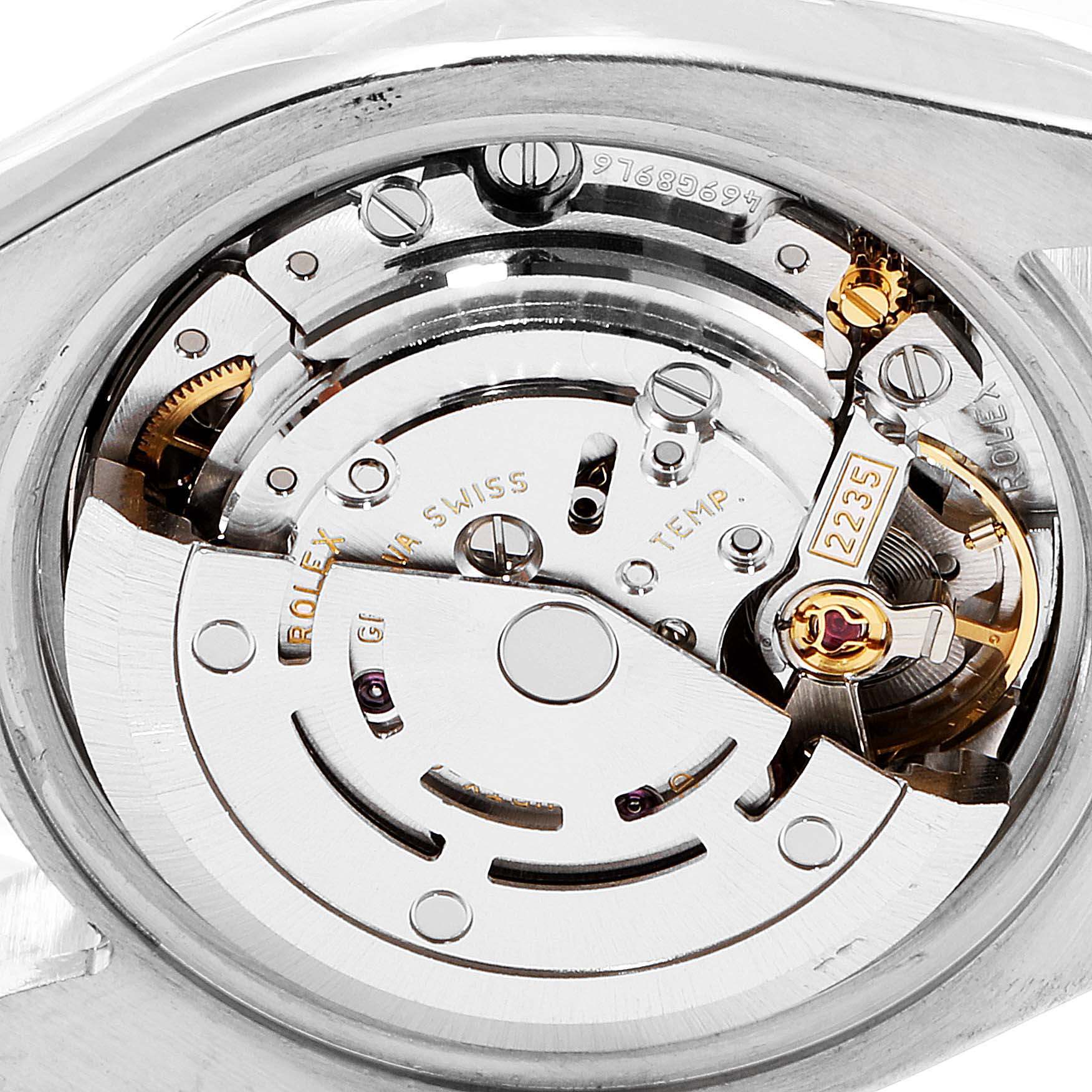 The image shows the internal movement mechanism of a Rolex Datejust 179173 Women
s Steel and Gold (two tone) Champagne Dial 179173 Women
s Steel and Gold (two tone) Champagne Dial watch from a close-up angle.