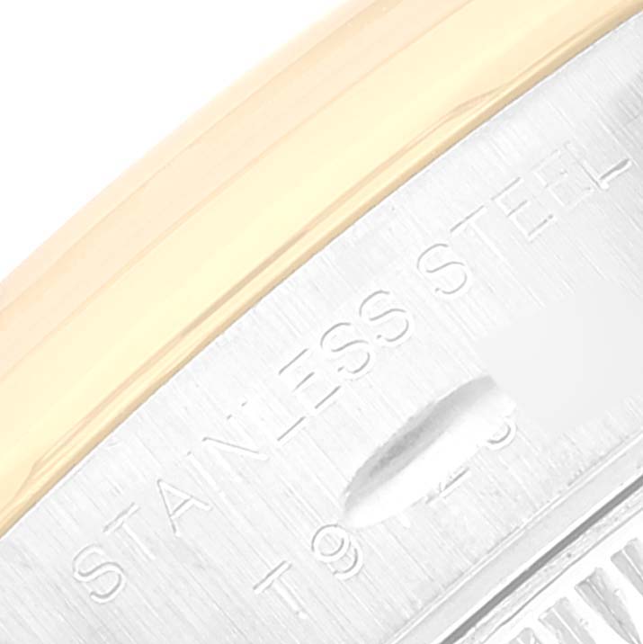 The image shows a close-up of the side of a Rolex Datejust 69163 Women's Steel and Gold (two tone) Grey Dial 69163 Women's Steel and Gold (two tone) Grey Dial watch, featuring the stainless steel casing and part of the bezel.