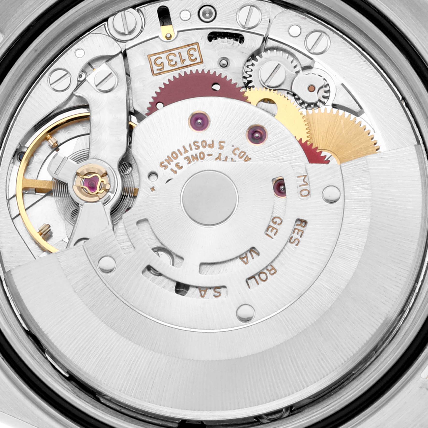 This image shows a close-up of the Rolex Datejust 16233 Men's Steel and Gold (two tone) White Dial 16233 Men's Steel and Gold (two tone) White Dial watch's movement mechanism from the back.