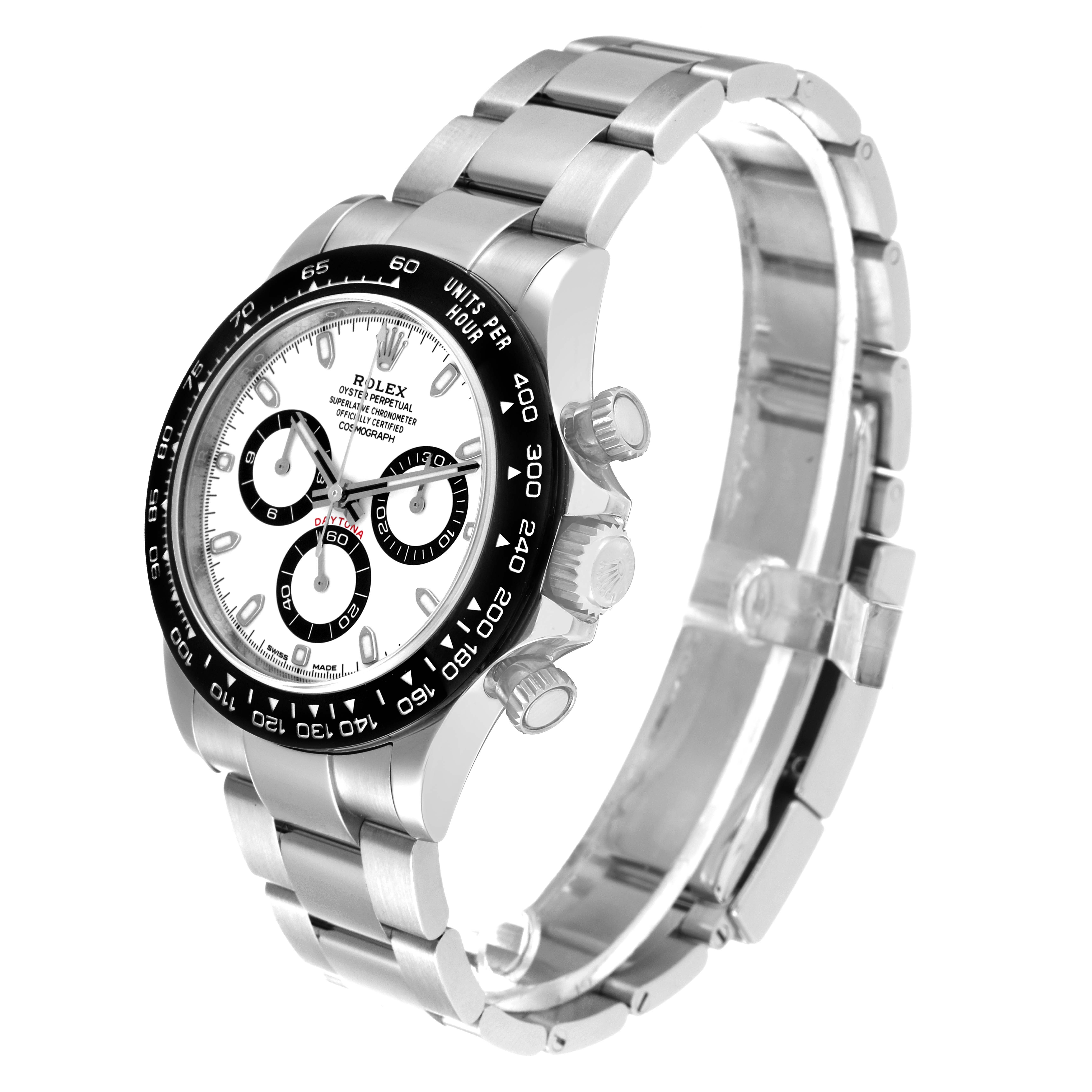 The image shows a Rolex Daytona 116500 Men's Stainless Steel White Dial 116500 Men's Stainless Steel White Dial watch from an angled view, highlighting the face, bezel, crown, and bracelet.