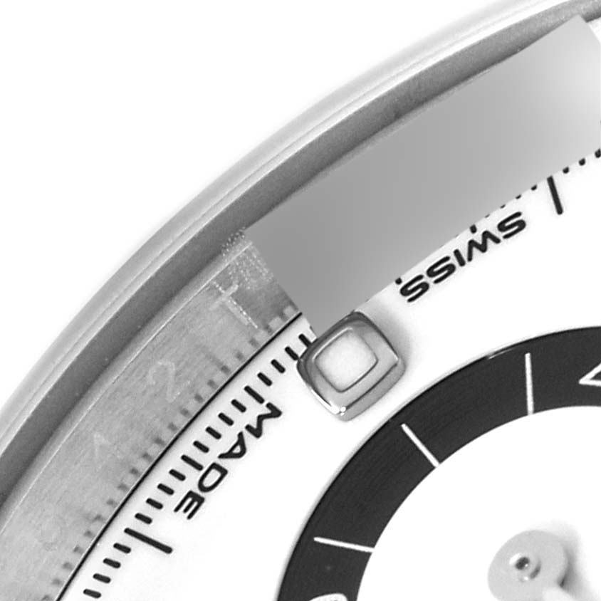 This image shows a close-up of the dial and bezel of a Rolex Daytona 116500 Men's Stainless Steel White Dial 116500 Men's Stainless Steel White Dial watch, focusing on the "SWISS" text and part of a sub-dial.
