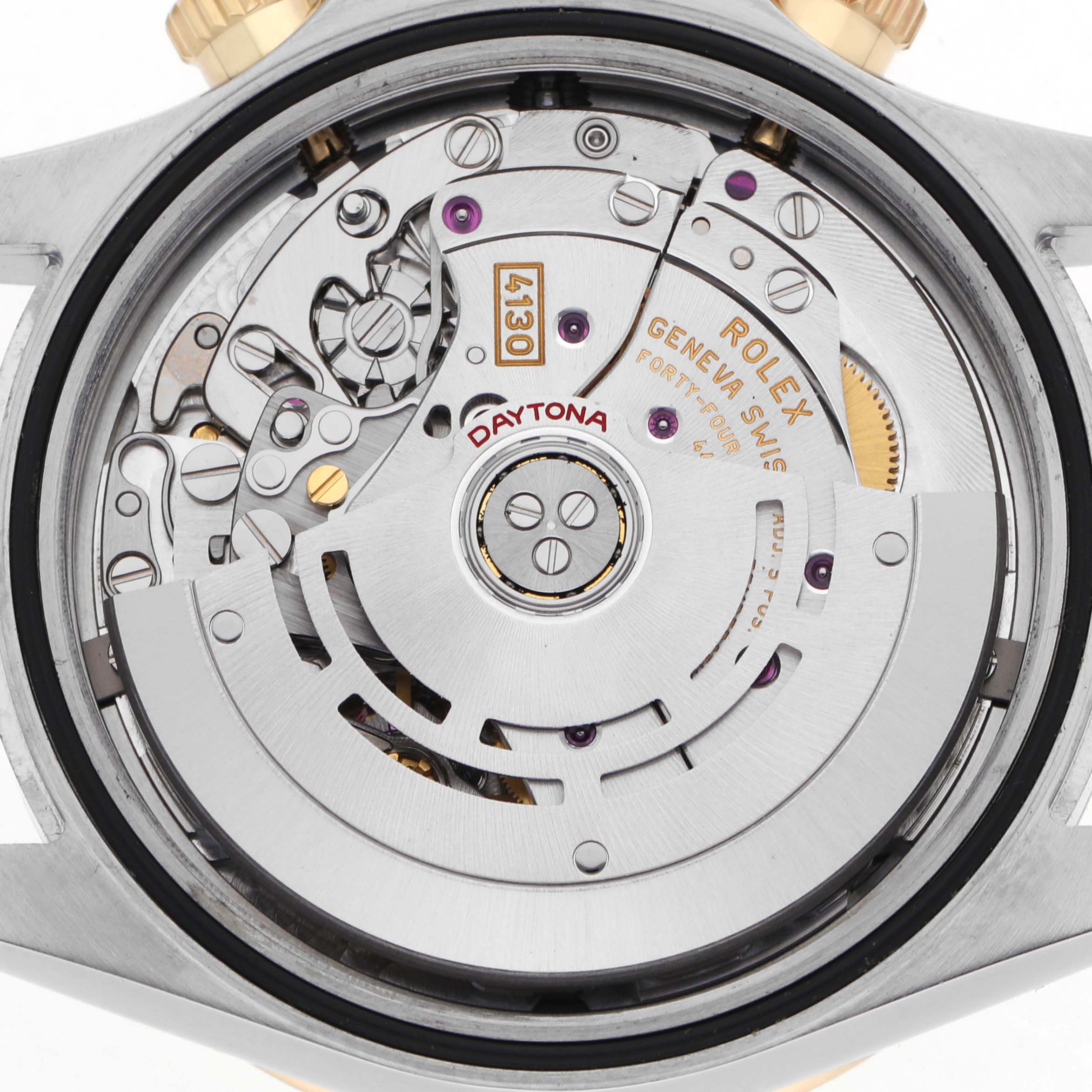 The image shows the movement and intricate internal components of a Rolex Daytona 116503 Men's Steel and Gold (two tone) Black Dial watch from a top-down angle.