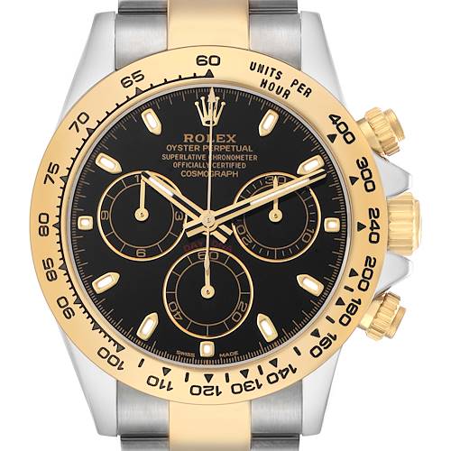 The Rolex Daytona 116503 Men's Steel and Gold (two tone) Black Dial watch is shown from the front, displaying the black dial, gold bezel, pushers, and parts of the bracelet.