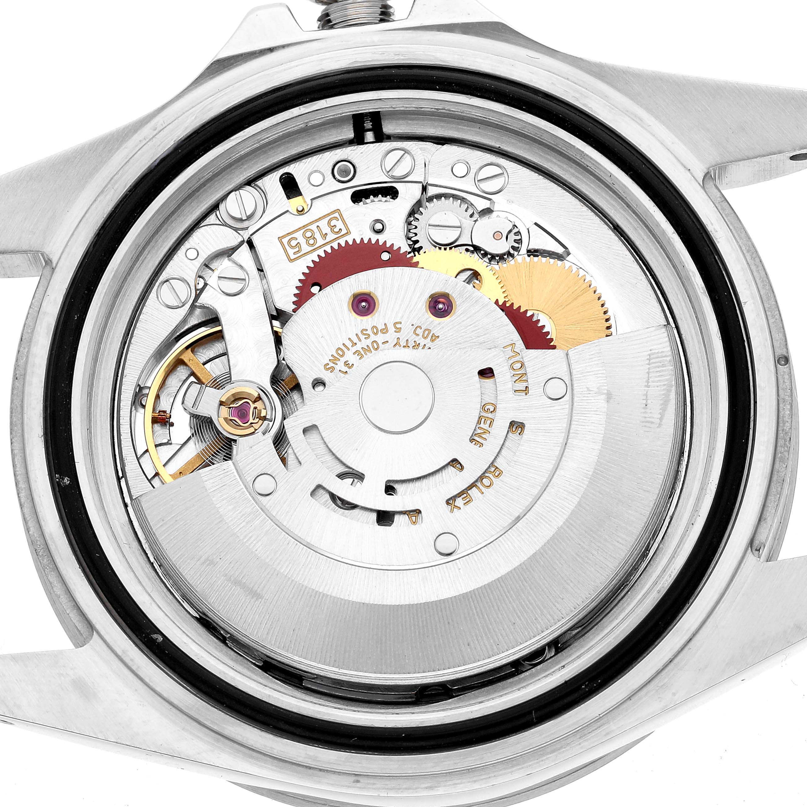 The image shows the back of the Rolex Explorer 16570 Men's Stainless Steel Black Dial watch, highlighting its movement and internal mechanical parts.