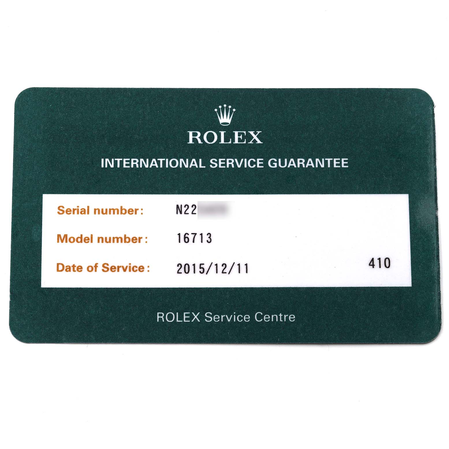 This image shows an international service guarantee card for a Rolex GMT-Master 16713 Men's Steel and Gold (two tone) Black Dial 16713 Men's Steel and Gold (two tone) Black Dial model.