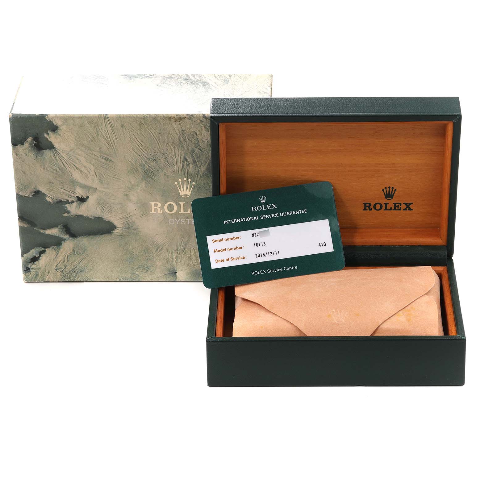 The image shows a Rolex GMT-Master 16713 Men's Steel and Gold (two tone) Black Dial 16713 Men's Steel and Gold (two tone) Black Dial watch box, an international service guarantee card, and a leather pouch, all from a frontal angle.