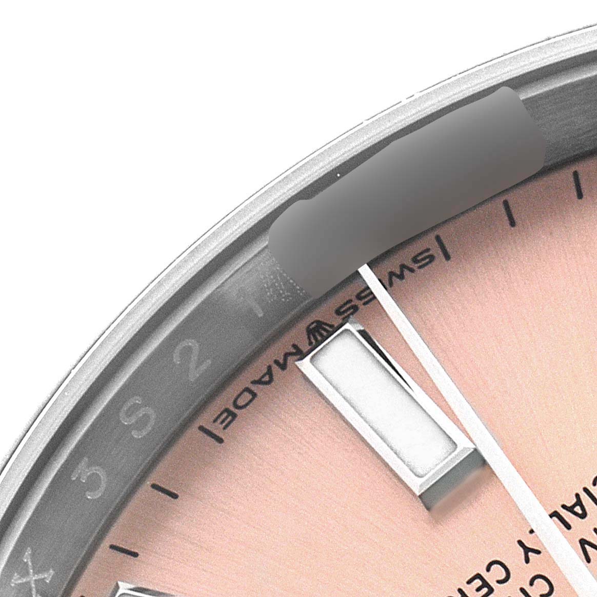 The image shows a close-up of the dial and hour markers of a Rolex Oyster Perpetual 124200 Men
s Stainless Steel Pink Dial 124200 Men
s Stainless Steel Pink Dial watch, viewed from an angled perspective.