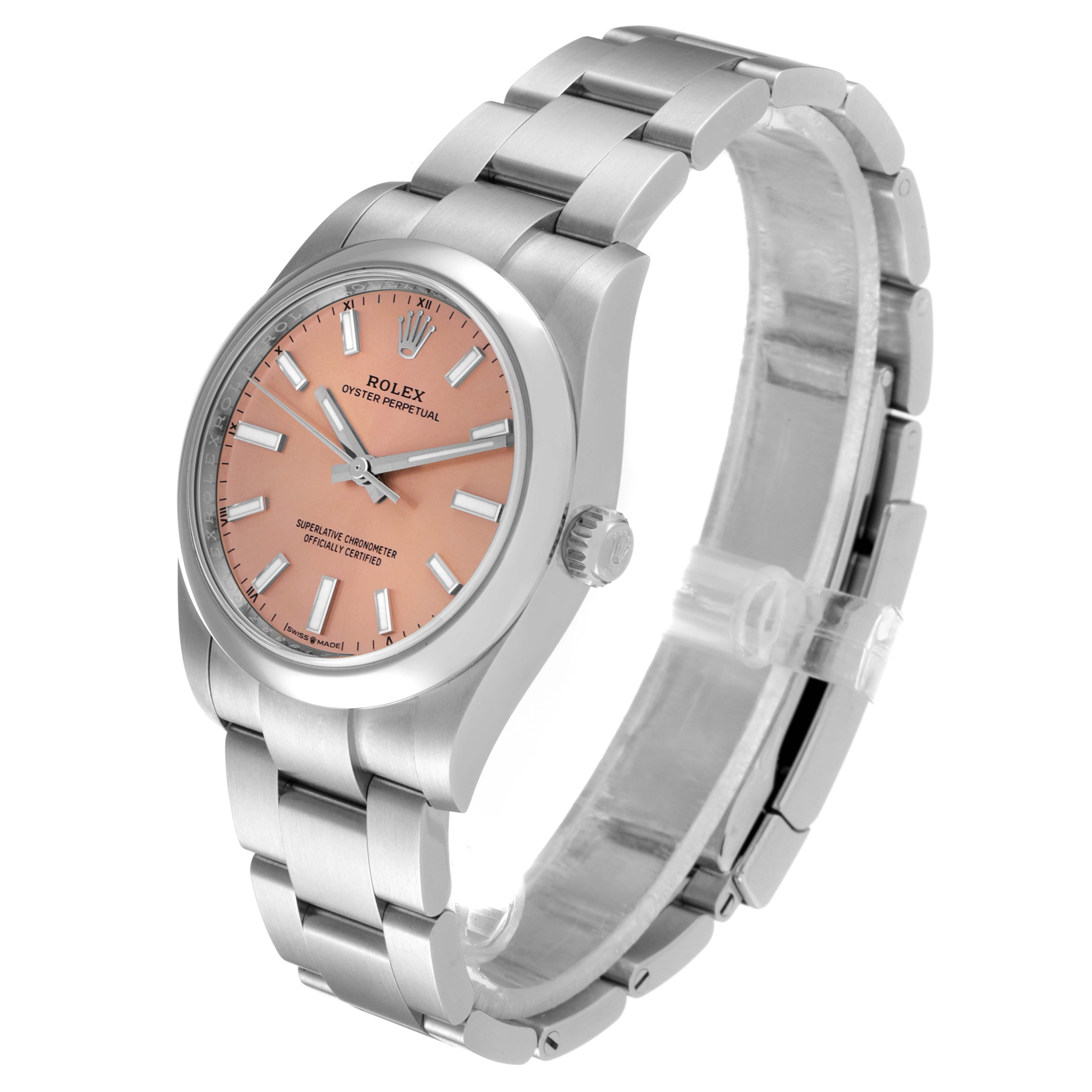 The image shows a side angle of a Rolex Oyster Perpetual 124200 Men
s Stainless Steel Pink Dial 124200 Men
s Stainless Steel Pink Dial watch, displaying its pink dial and metal bracelet.