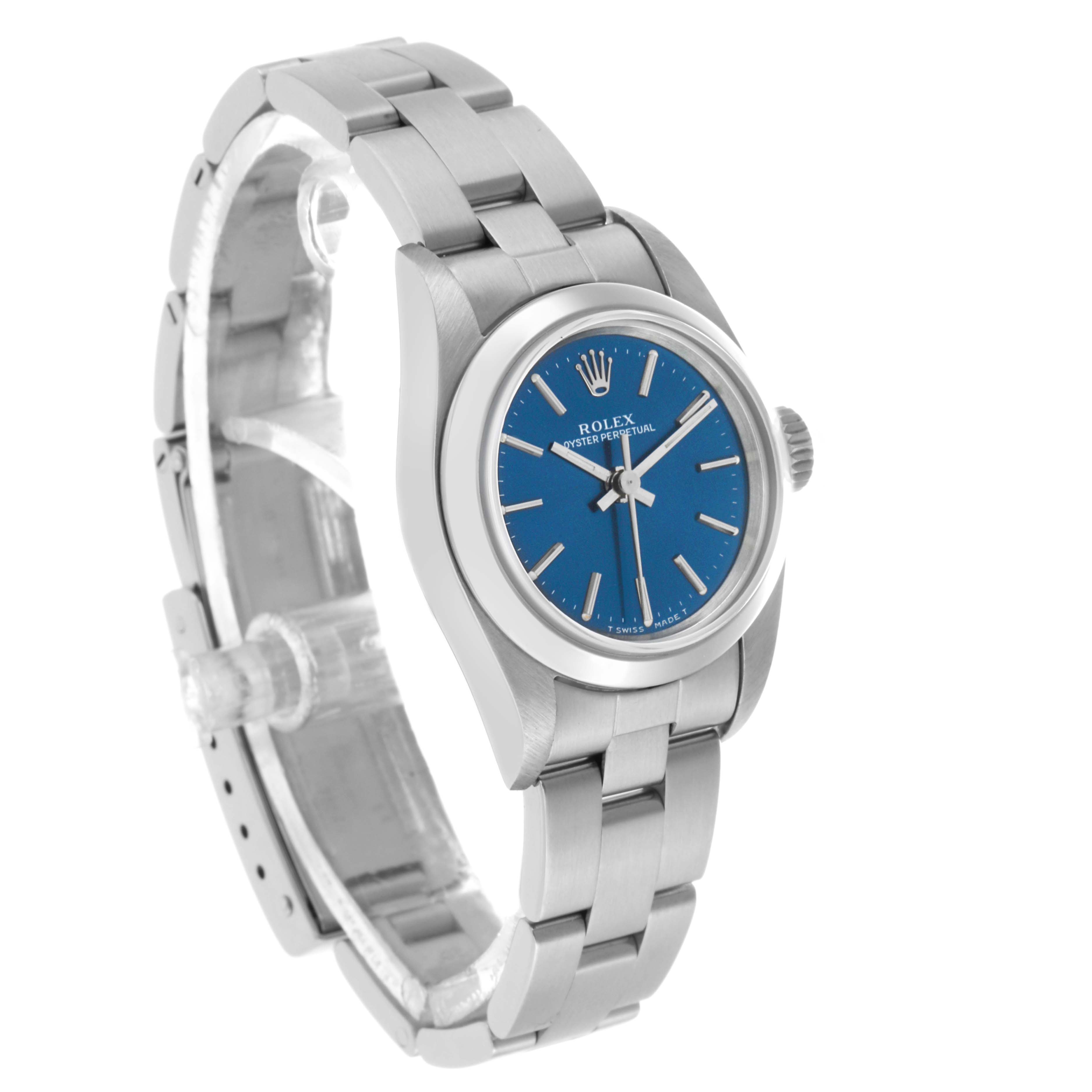 The Rolex Oyster Perpetual 67180 Women's Stainless Steel Blue Dial watch is shown at a three-quarter angle, displaying the face, crown, and bracelet links.