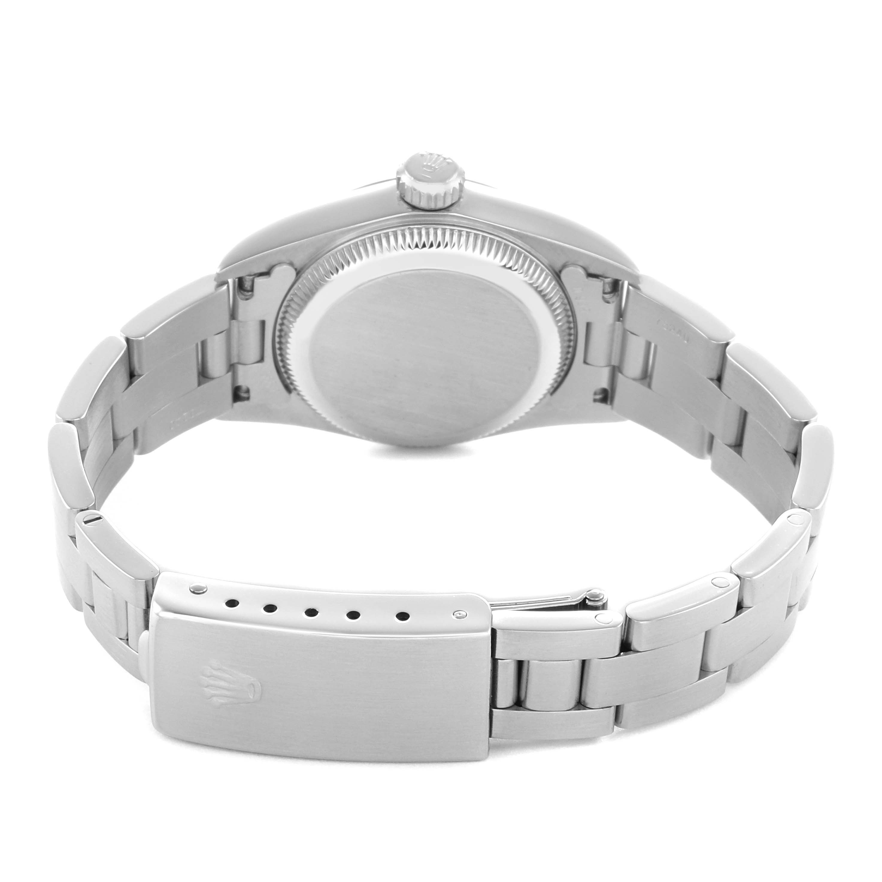 The image shows the back of the Rolex Oyster Perpetual 67180 Women's Stainless Steel Blue Dial watch, highlighting the case back and bracelet clasp.