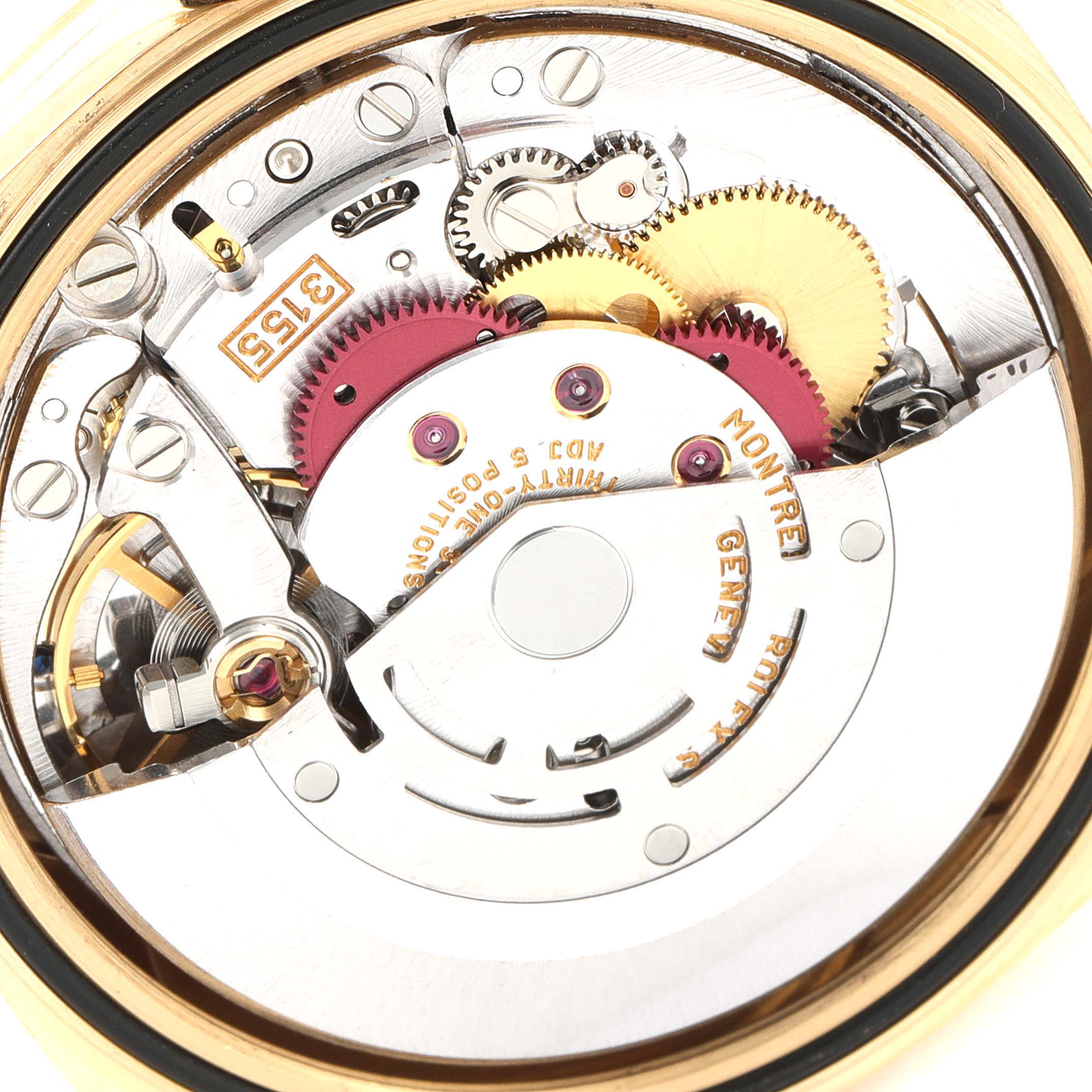 The image shows the internal mechanical movement of a Rolex President 18238 Men's Yellow Gold Champagne Dial 18238 Men's Yellow Gold Champagne Dial model watch, displaying gears and components.