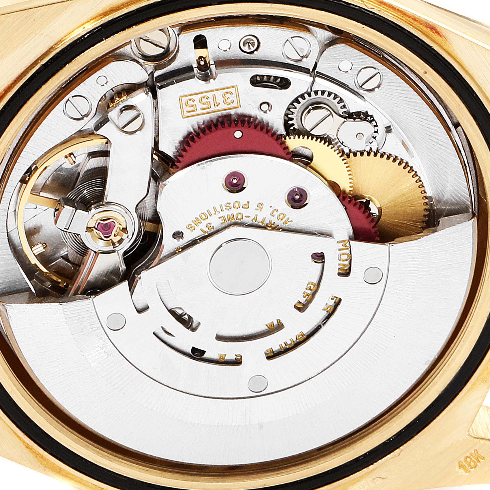 This image shows the internal mechanism of a Rolex President 18238 Men's Yellow Gold Beige Dial 18238 Men's Yellow Gold Beige Dial model watch, specifically the movement and gears.