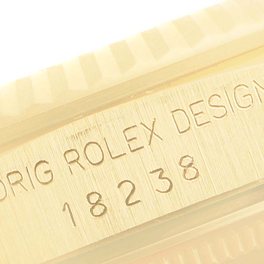 The image shows the model number engraving on the case side of a Rolex President 18238 Men's Yellow Gold Champagne Dial 18238 Men's Yellow Gold Champagne Dial watch.