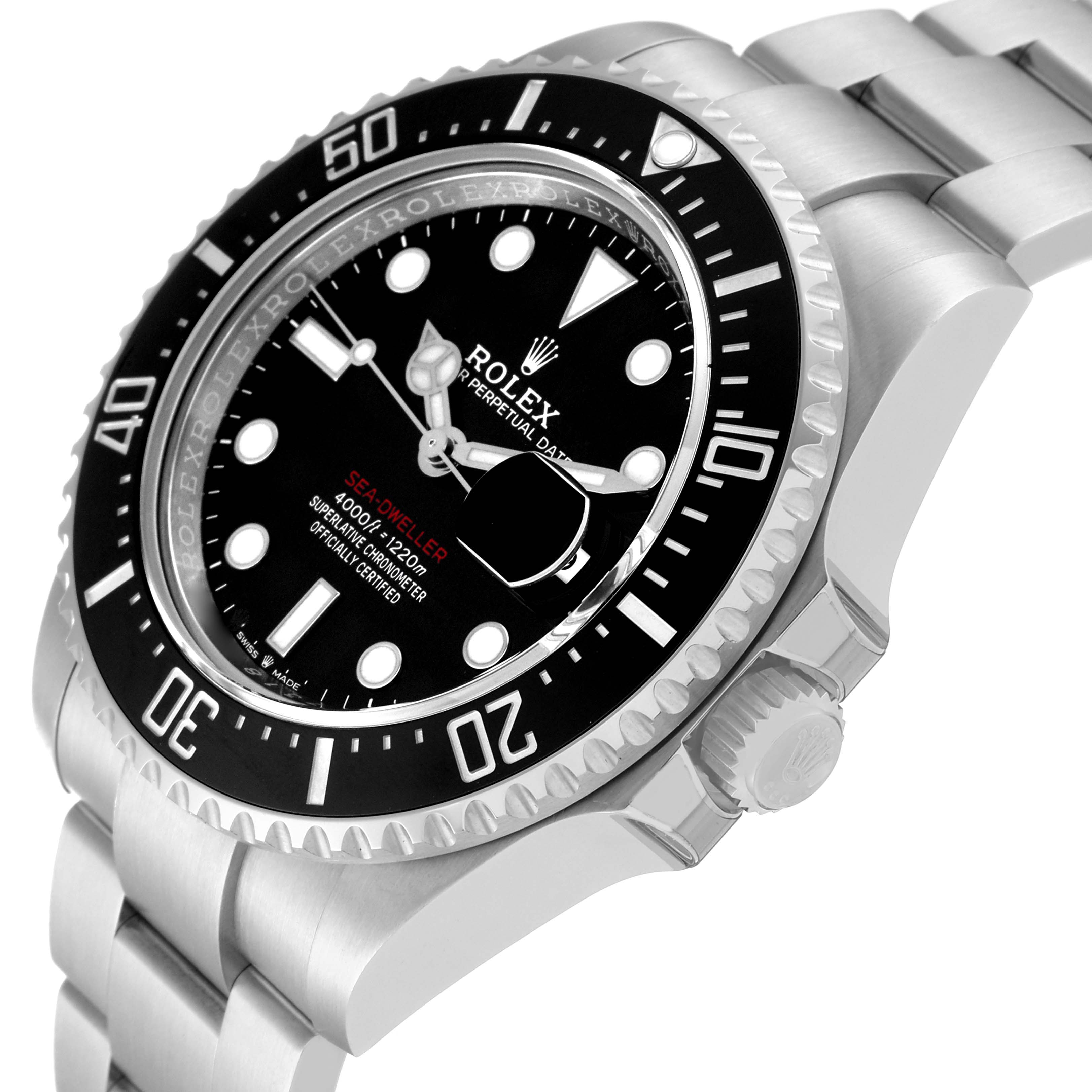 The Rolex Sea-Dweller 126600 Men
s Stainless Steel Black Dial 126600 Men
s Stainless Steel Black Dial watch is shown at an angle displaying the face, bezel, crown, and part of the bracelet.