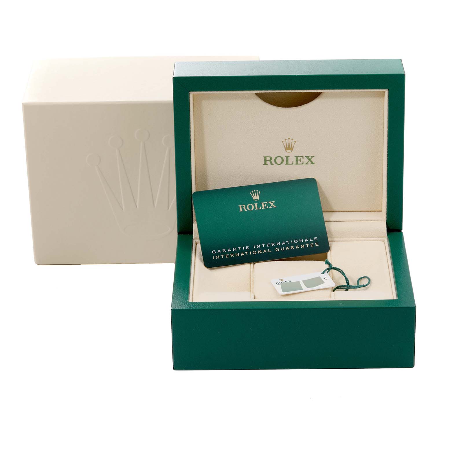 The image shows the open green box, warranty card, and tag of the Rolex Sea-Dweller 126600 Men
s Stainless Steel Black Dial 126600 Men
s Stainless Steel Black Dial watch.