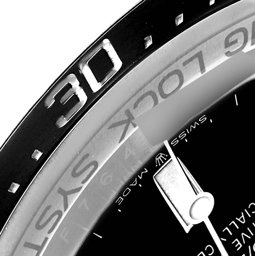 This image shows a close-up of the bezel and partial dial of a Rolex Sea-Dweller 126660 Men's Stainless Steel Black Dial 126660 Men's Stainless Steel Black Dial watch, highlighting the "30" minute marker.