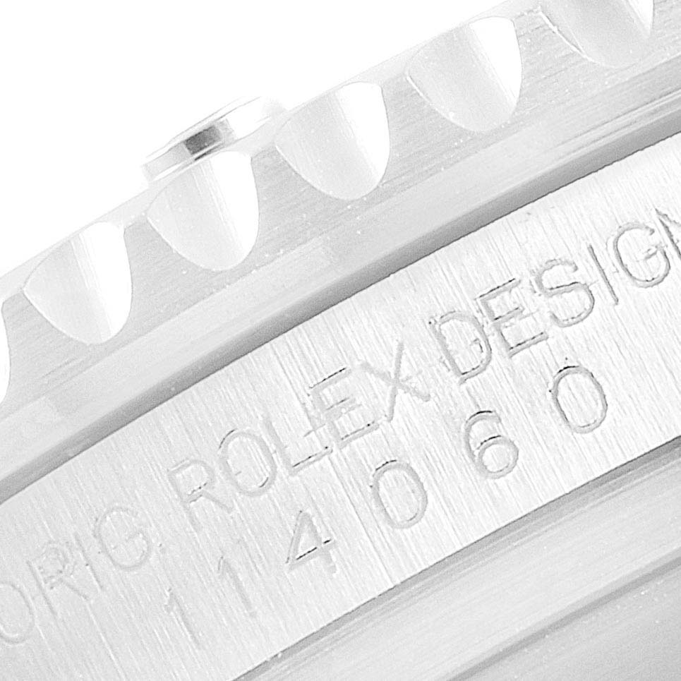 The image shows a close-up angle of the bezel and engraved case of a Rolex Submariner 114060 Men
s Stainless Steel Black Dial 114060 Men
s Stainless Steel Black Dial.
