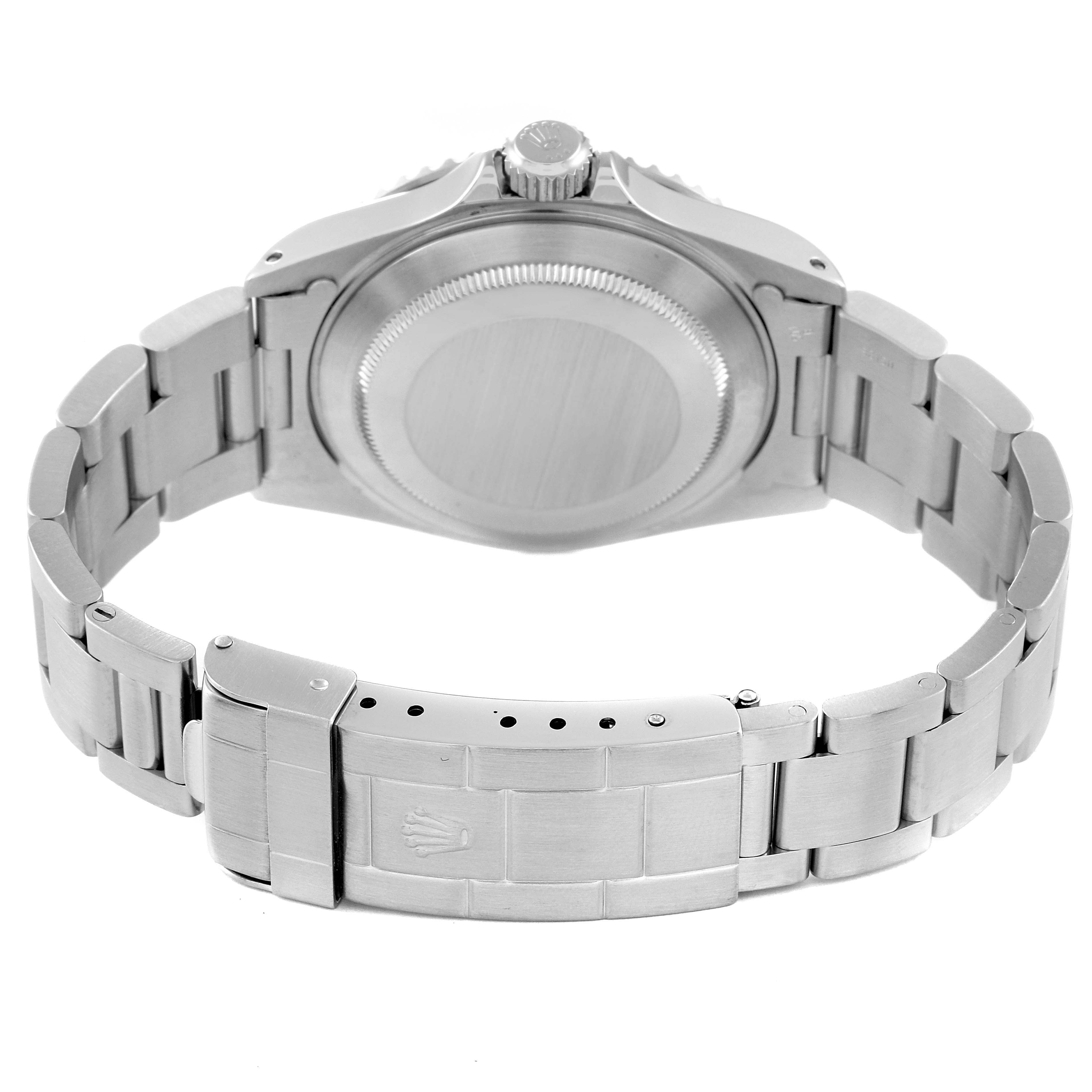 The image shows the back case and bracelet of a Rolex Submariner 14060 Men
s Stainless Steel Black Dial 14060 Men
s Stainless Steel Black Dial watch from a rear angle.