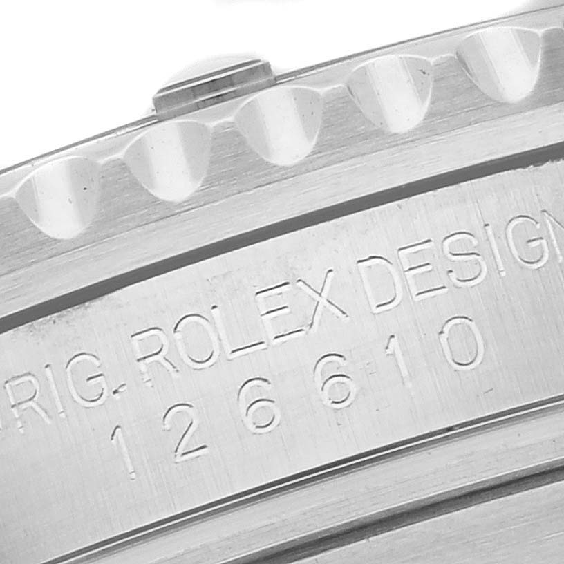 The image shows a close-up of the side of a Rolex Submariner 126610LN Men's Stainless Steel Black Dial 126610LN Men's Stainless Steel Black Dial watch, highlighting the bezel edge and engraved model number.