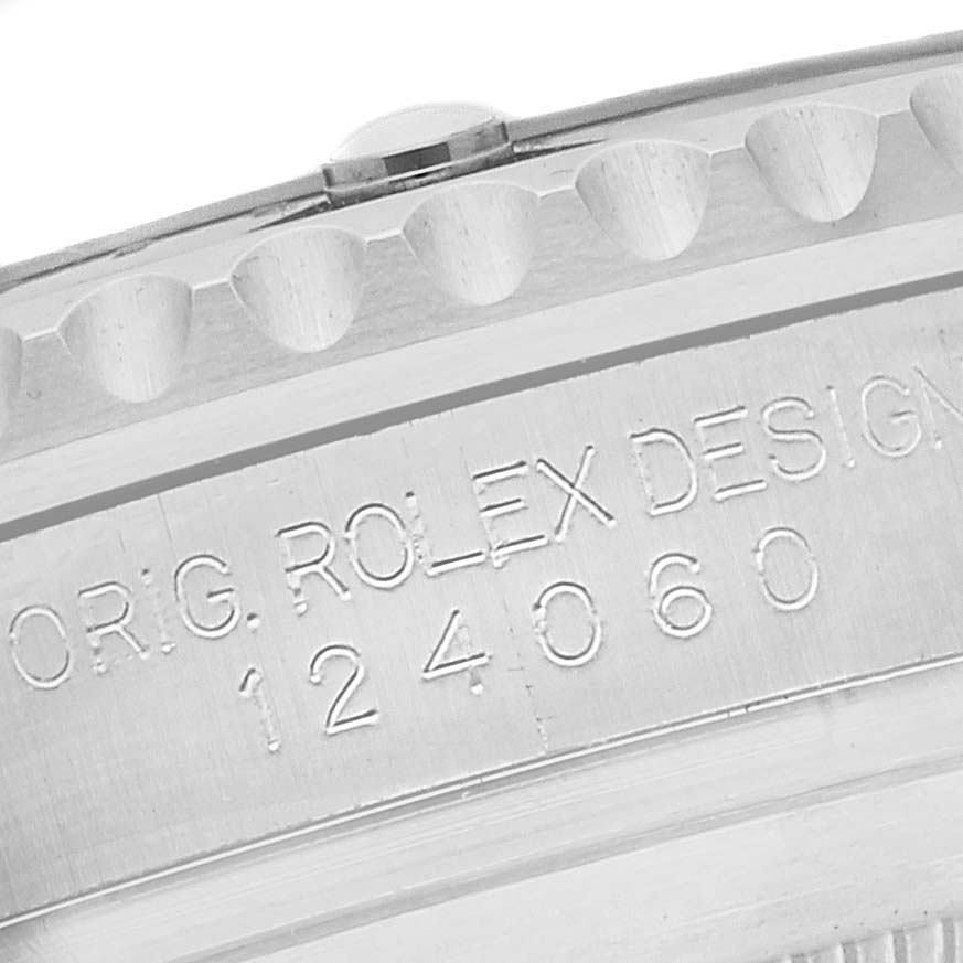 This close-up image shows the Rolex Submariner 124060 Men
s Stainless Steel Black Dial 124060 Men
s Stainless Steel Black Dial
s model number engraved on its side.