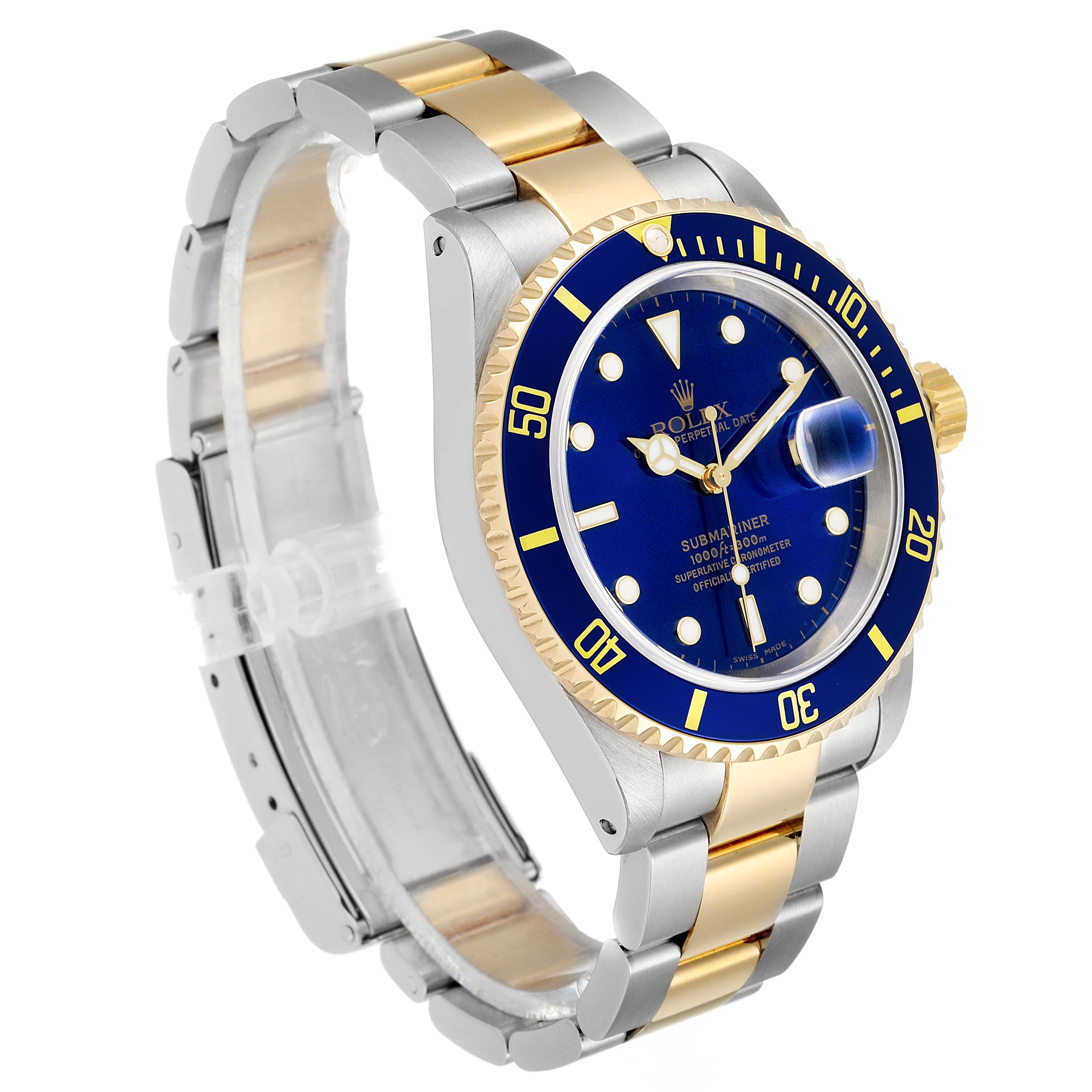 The image shows a Rolex Submariner 16613 Men's Steel and Gold (two tone) Blue Dial 16613 Men's Steel and Gold (two tone) Blue Dial watch at a slightly angled side view, highlighting its blue bezel, dial, and two-tone bracelet.