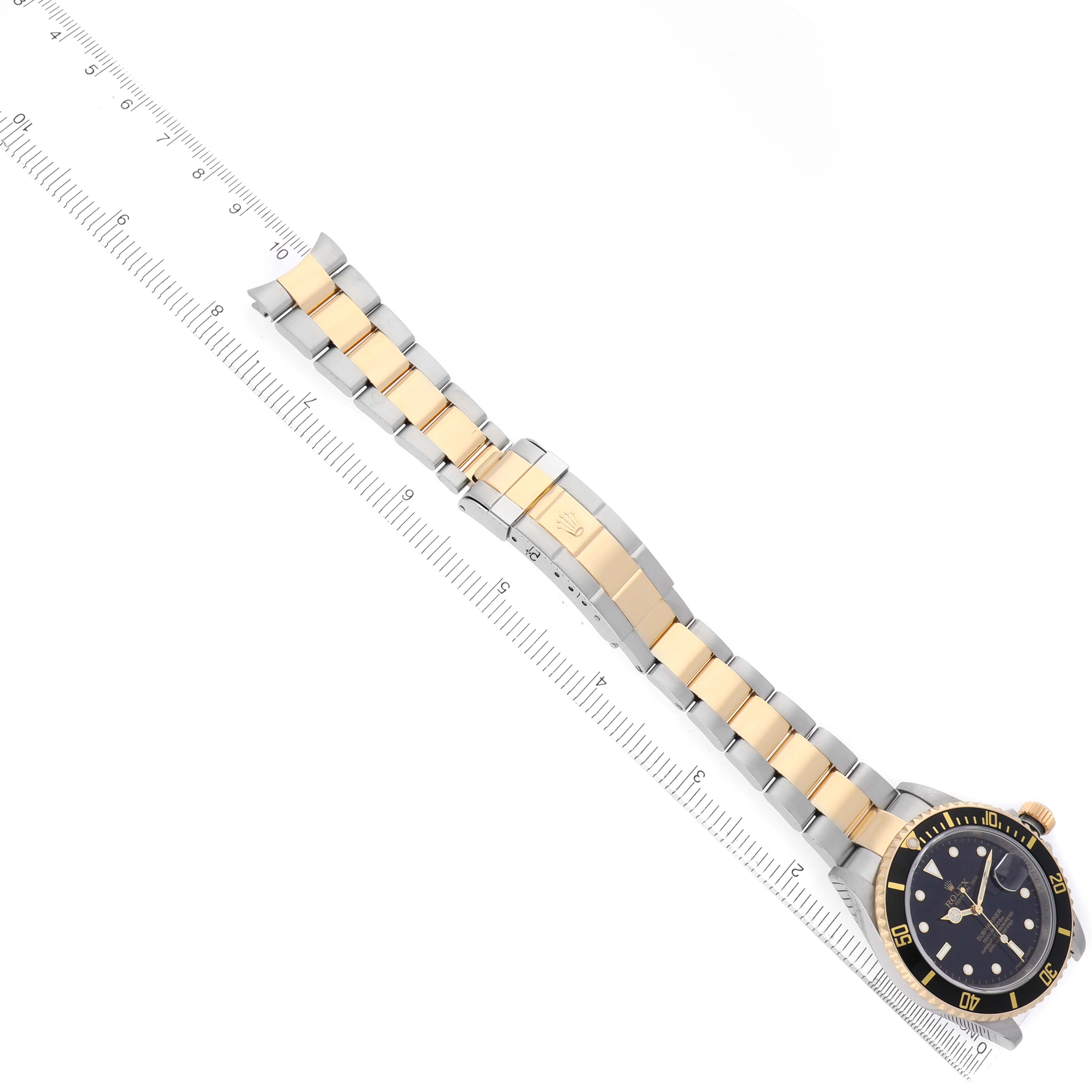 The Rolex Submariner 16613 Men's Steel and Gold (two tone) Black Dial watch is shown from a top view with its bracelet and bezel prominently displayed.