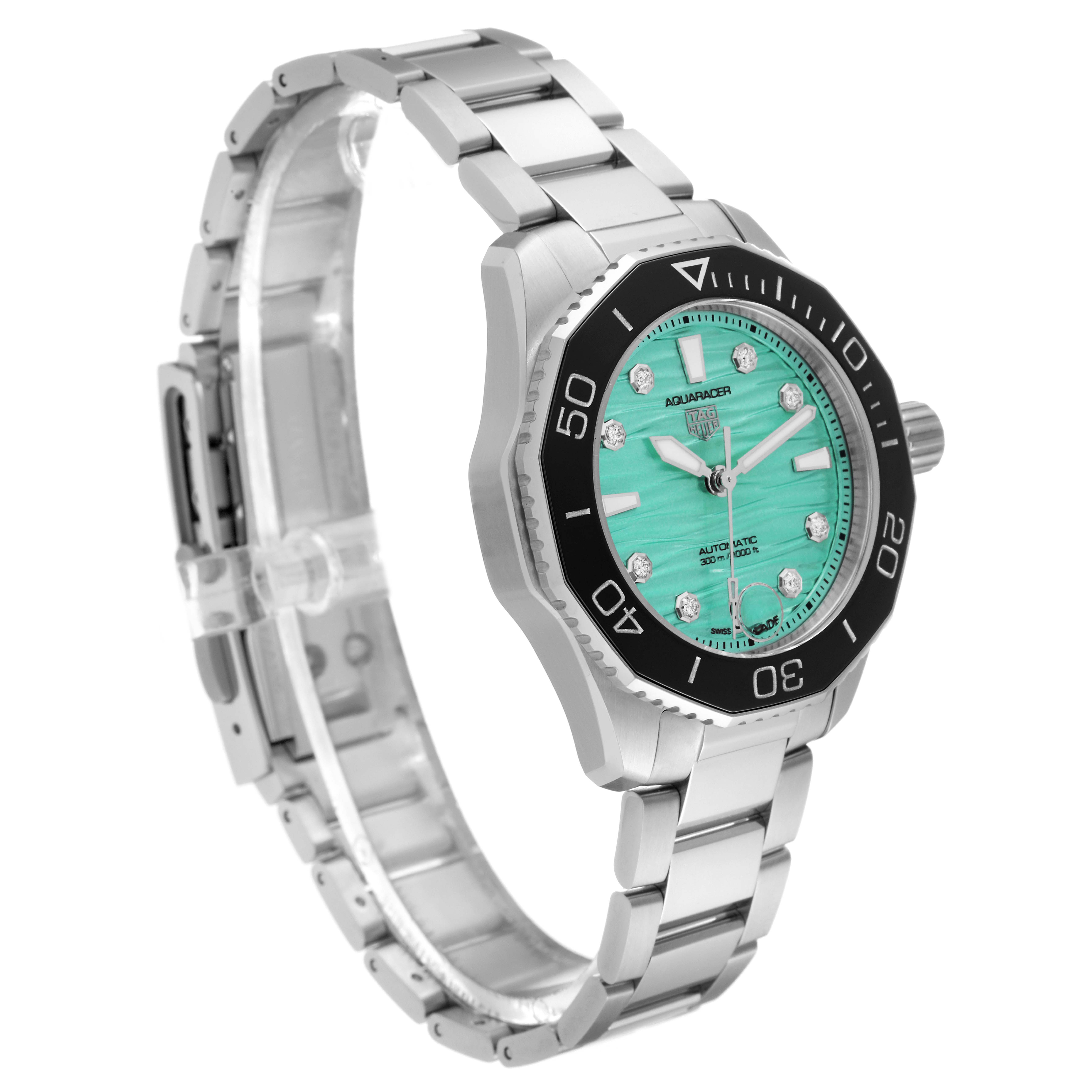 The image shows a side angle of the Tag Heuer Aquaracer WBP231K.BA0618 Women
s Stainless Steel Green Dial WBP231K.BA0618 Women
s Stainless Steel Green Dial watch, highlighting its bezel, dial, crown, and stainless steel bracelet.
