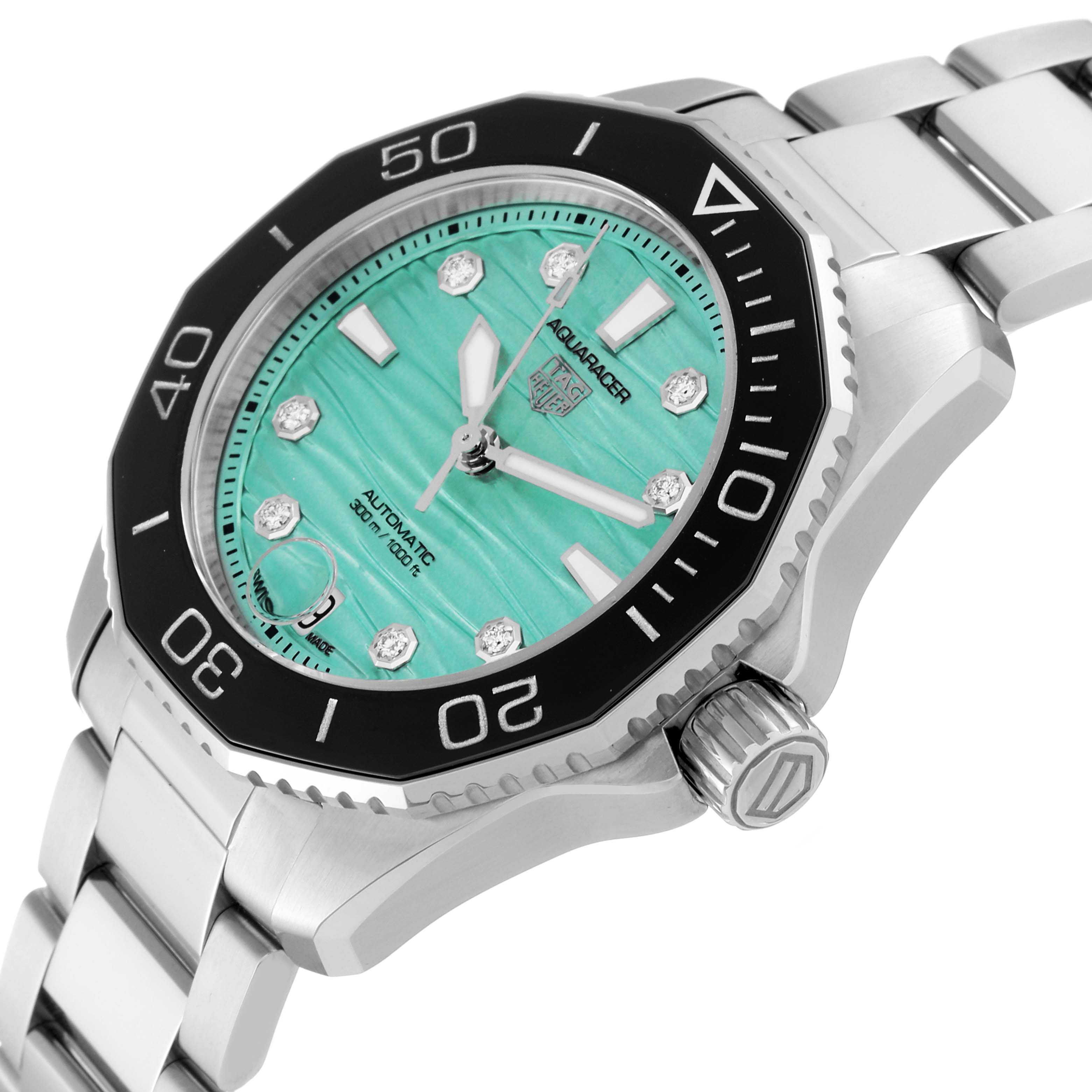 The image shows a Tag Heuer Aquaracer WBP231K.BA0618 Women
s Stainless Steel Green Dial WBP231K.BA0618 Women
s Stainless Steel Green Dial watch at an angled close-up, highlighting its bezel, dial, and bracelet.