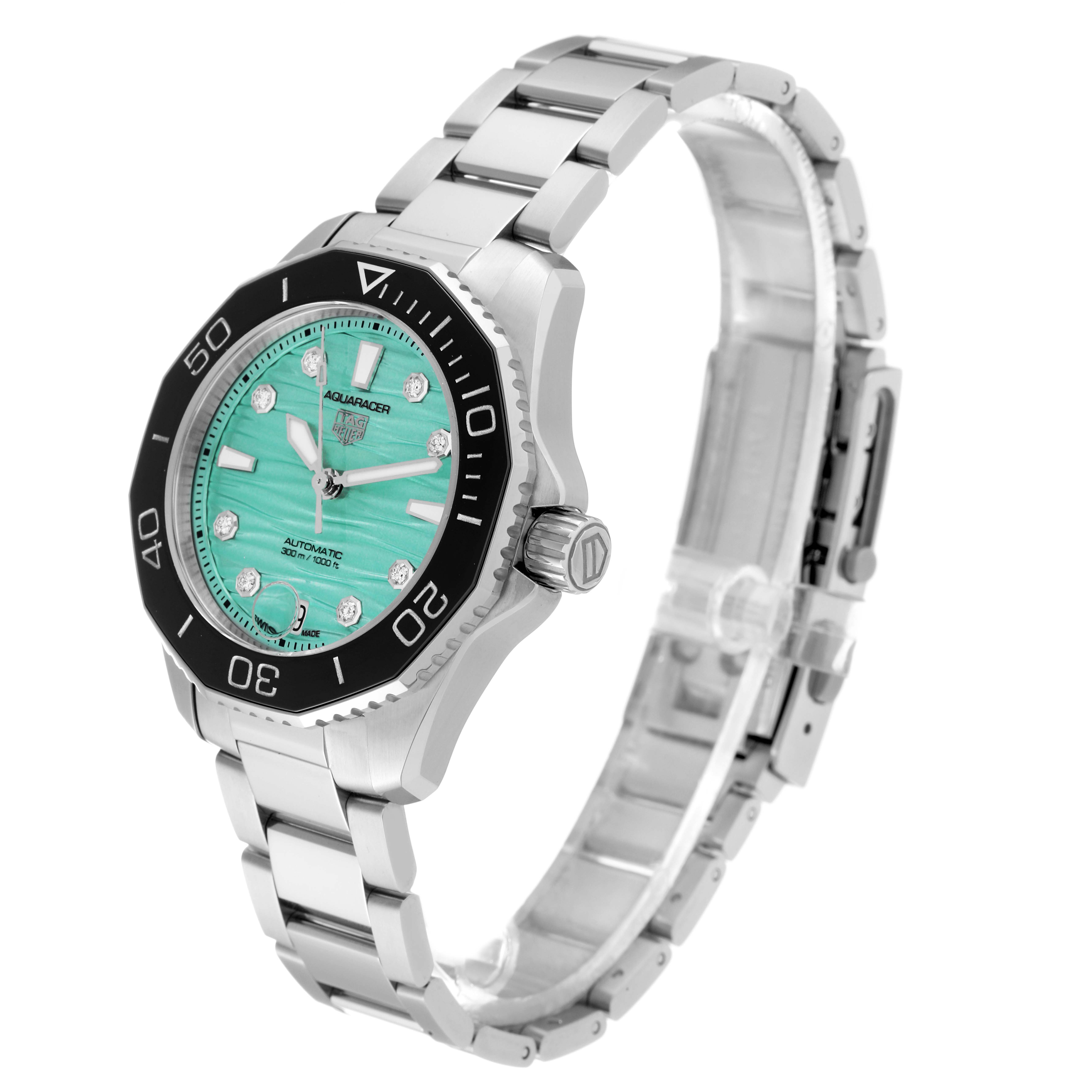 The Tag Heuer Aquaracer WBP231K.BA0618 Women
s Stainless Steel Green Dial WBP231K.BA0618 Women
s Stainless Steel Green Dial is shown at a three-quarter angle, highlighting its turquoise dial, bezel, and stainless steel bracelet.