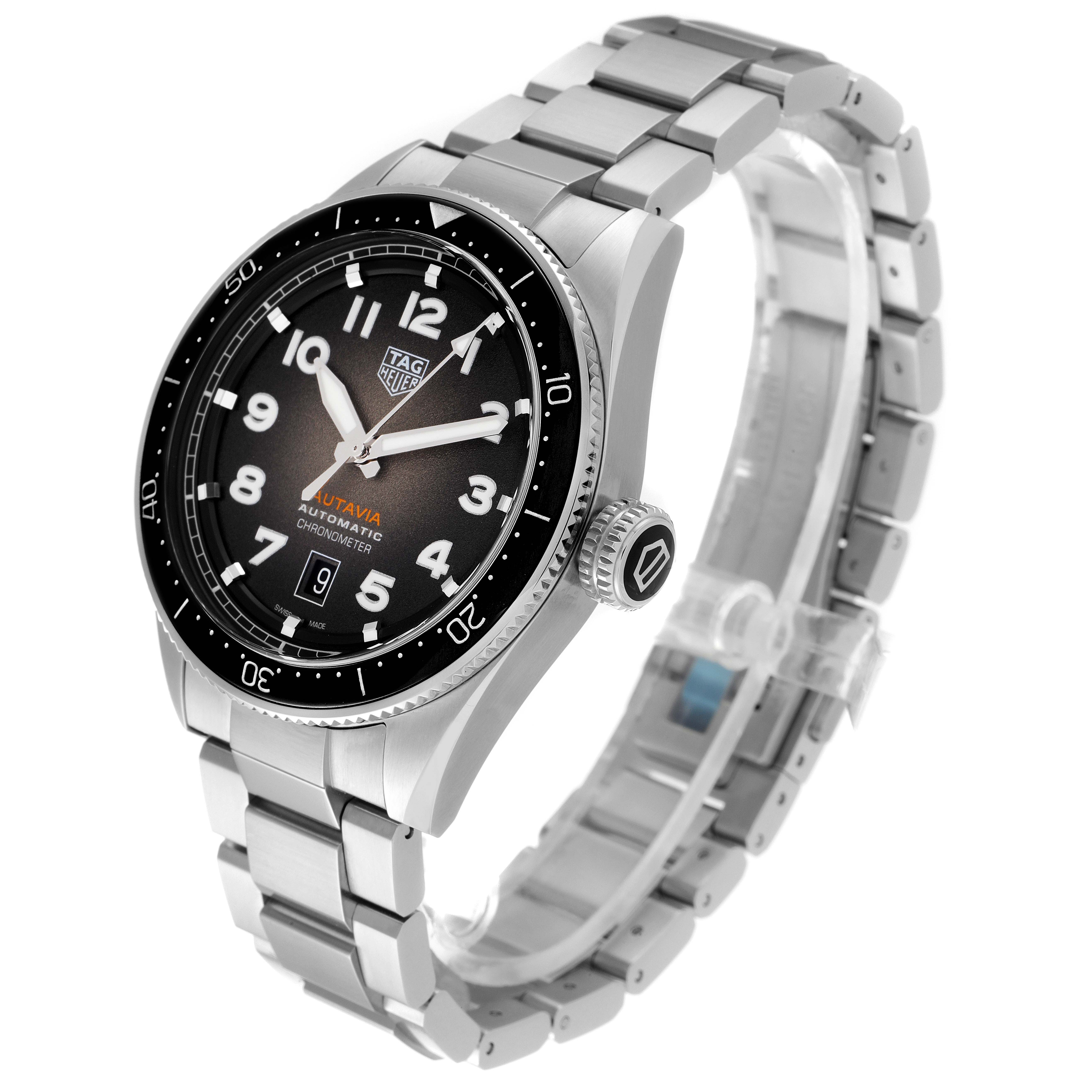 The image shows a Tag Heuer Autavia WBE5114.EB0173 Men's Stainless Steel Brown Dial WBE5114.EB0173 Men's Stainless Steel Brown Dial watch at a slight angle, prominently displaying its face, bezel, crown, and bracelet.