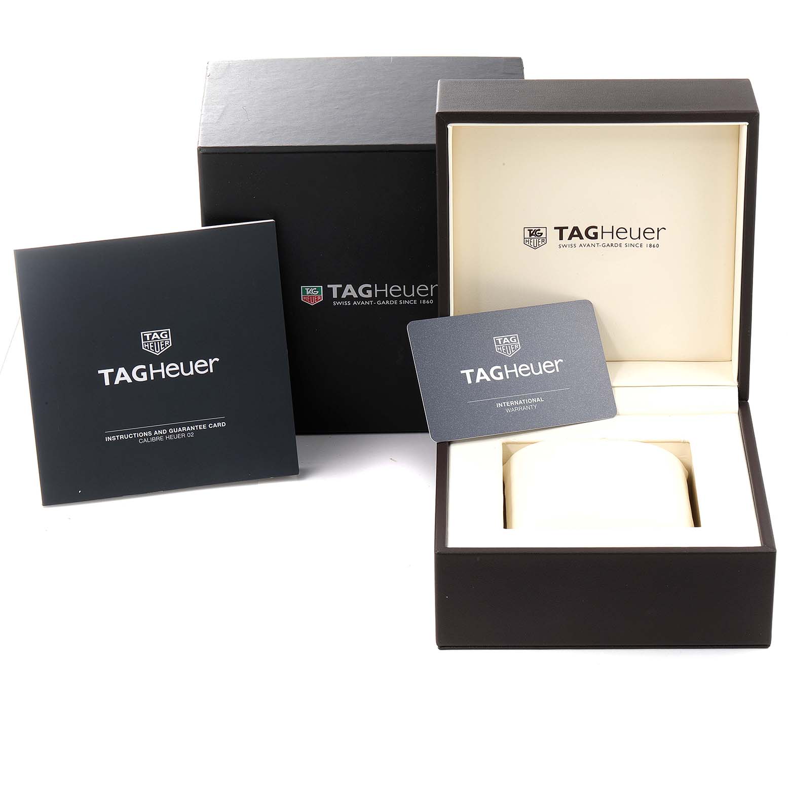 The image shows Tag Heuer Carrera CBG2A91.FT6173 Men
s Stainless Steel Black Dial CBG2A91.FT6173 Men
s Stainless Steel Black Dial watch packaging, including the box, warranty card, and instructions.