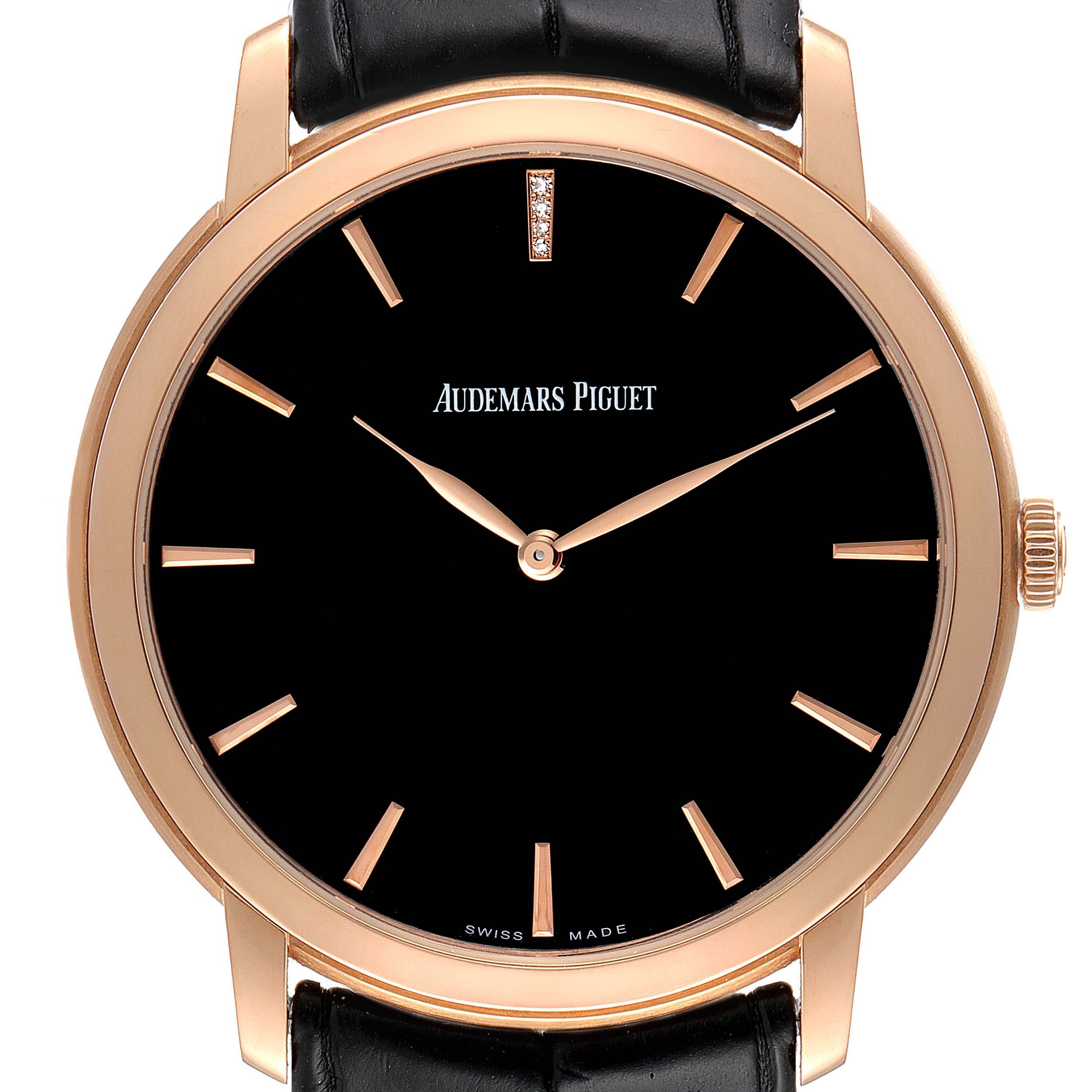 This image shows a front view of the black dial and rose gold casing of the Jules model by Audemars Piguet.