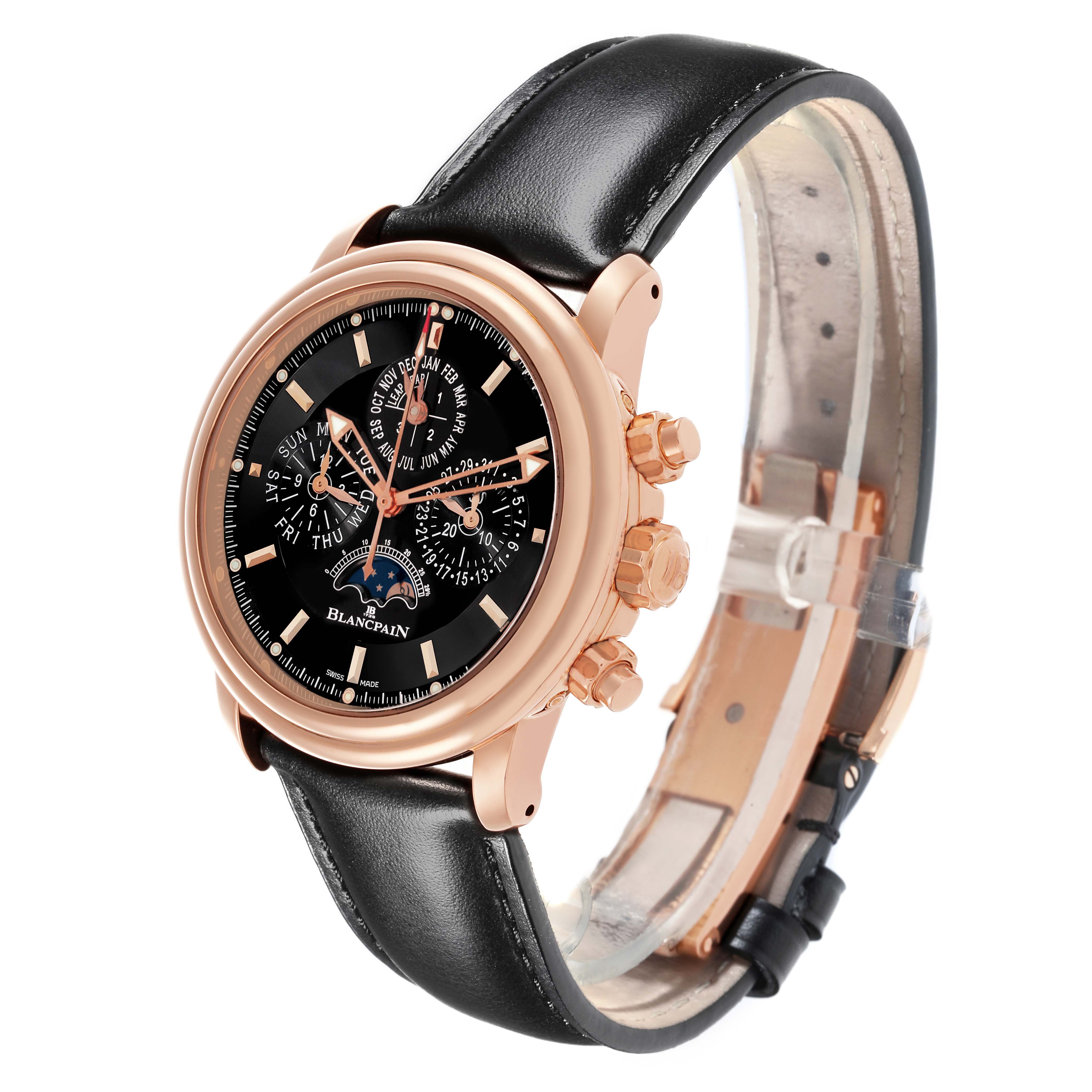 The Blancpain Villeret 2685F-3630-53B Men's Rose Gold Black Dial 2685F-3630-53B Men's Rose Gold Black Dial watch is shown at a three-quarter angle, highlighting its black dial, rose gold case, and leather strap.