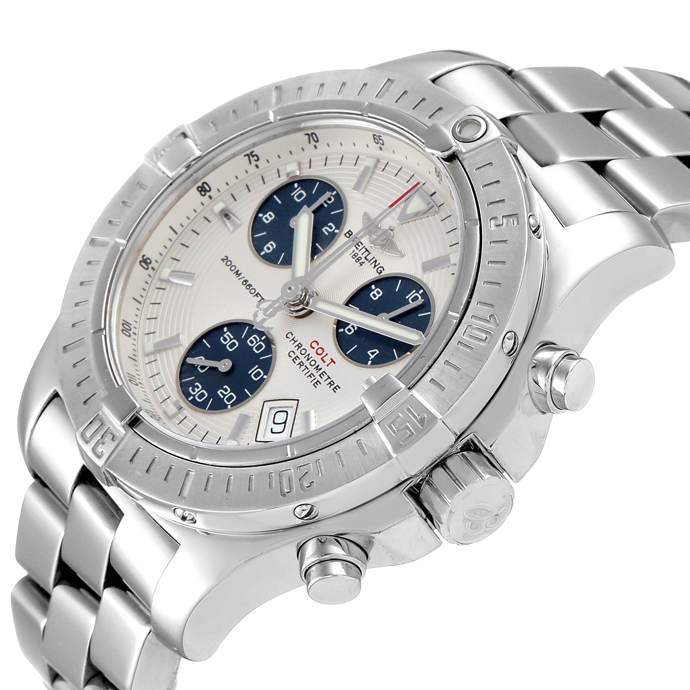 The Colt model by Breitling is shown at an angle highlighting its dial, bezel, buttons, and partial bracelet.