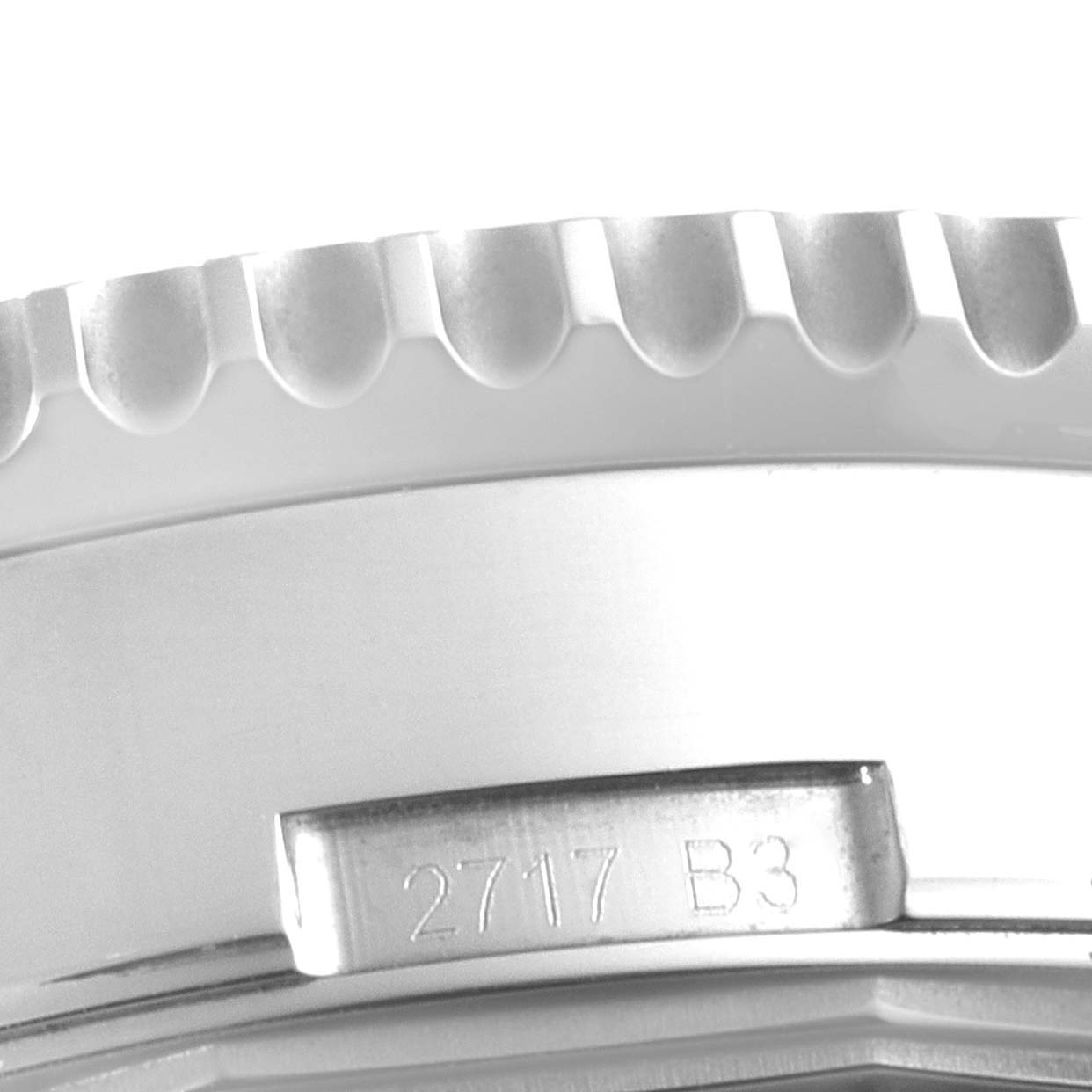 The image shows a close-up of the bezel and side of the Breitling Navitimer AB0127211C1A1 Men
s Stainless Steel Black Dial AB0127211C1A1 Men
s Stainless Steel Black Dial watch.