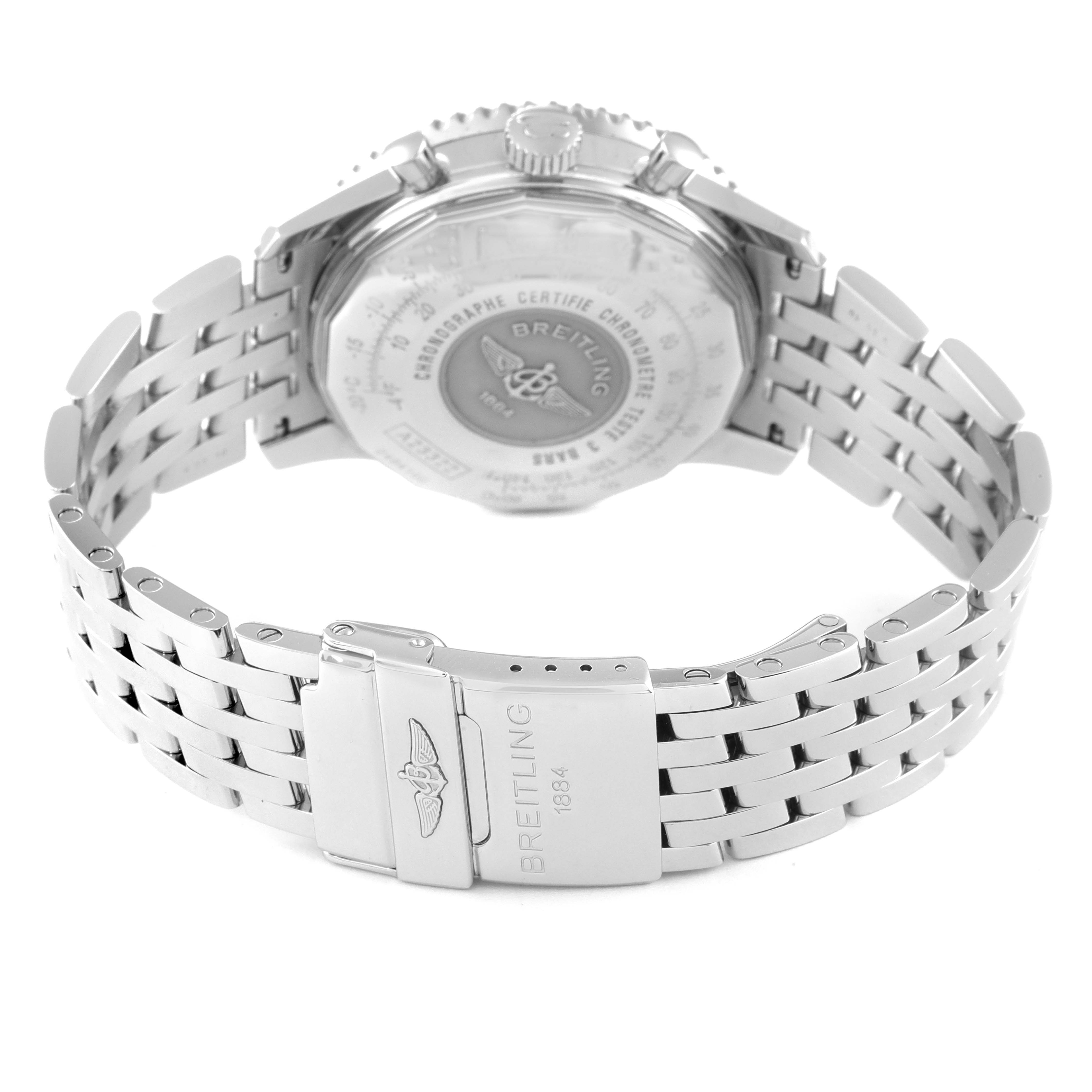 The image shows the back case and metal bracelet of a Breitling Navitimer A23322 Men
s Stainless Steel Blue Dial A23322 Men
s Stainless Steel Blue Dial watch, highlighting its clasp and engravings.