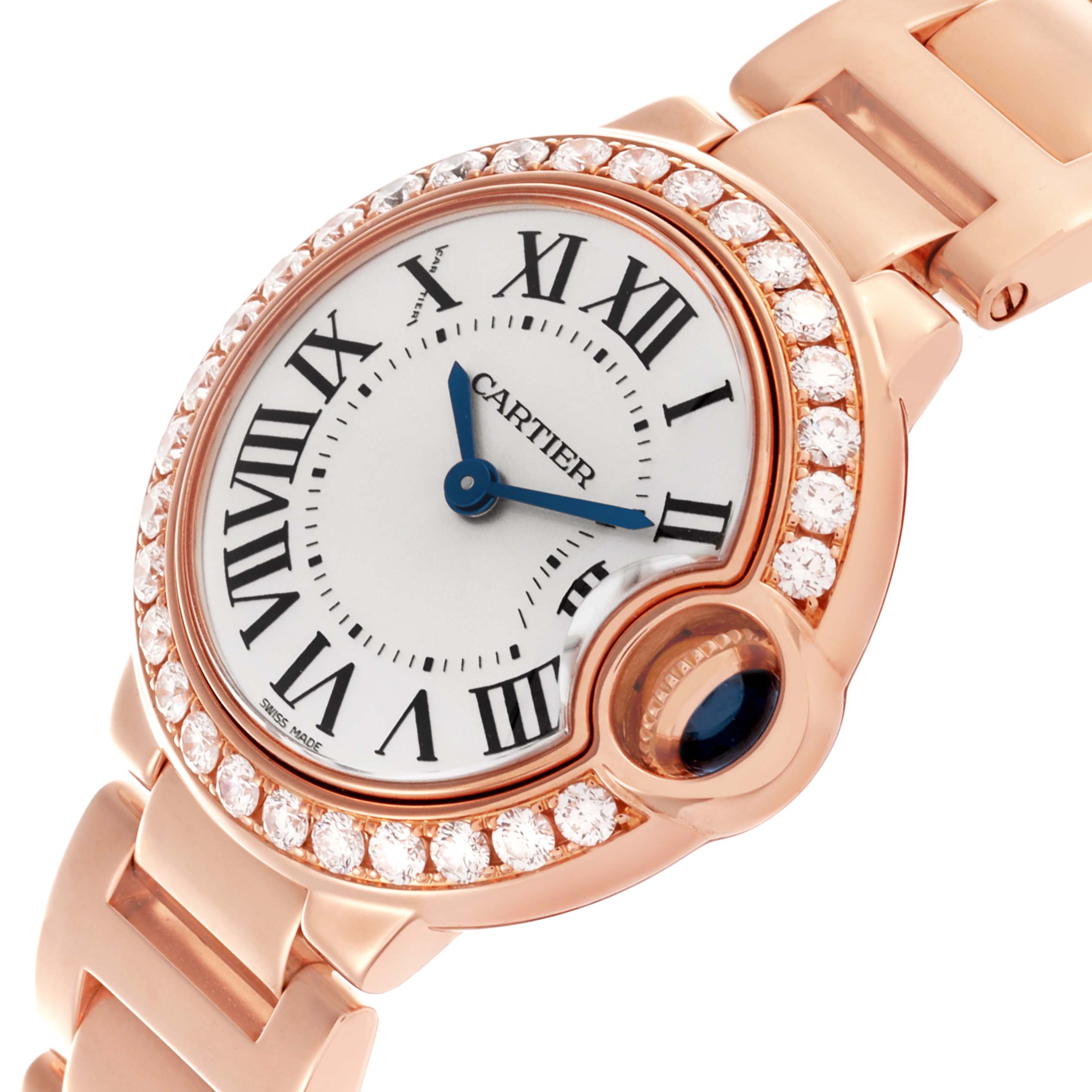 The Cartier Ballon Bleu WE9002Z3 Women's Rose Gold Silver Dial WE9002Z3 Women's Rose Gold Silver Dial watch is shown at an angle emphasizing its round face, diamond bezel, and blue sapphire crown.