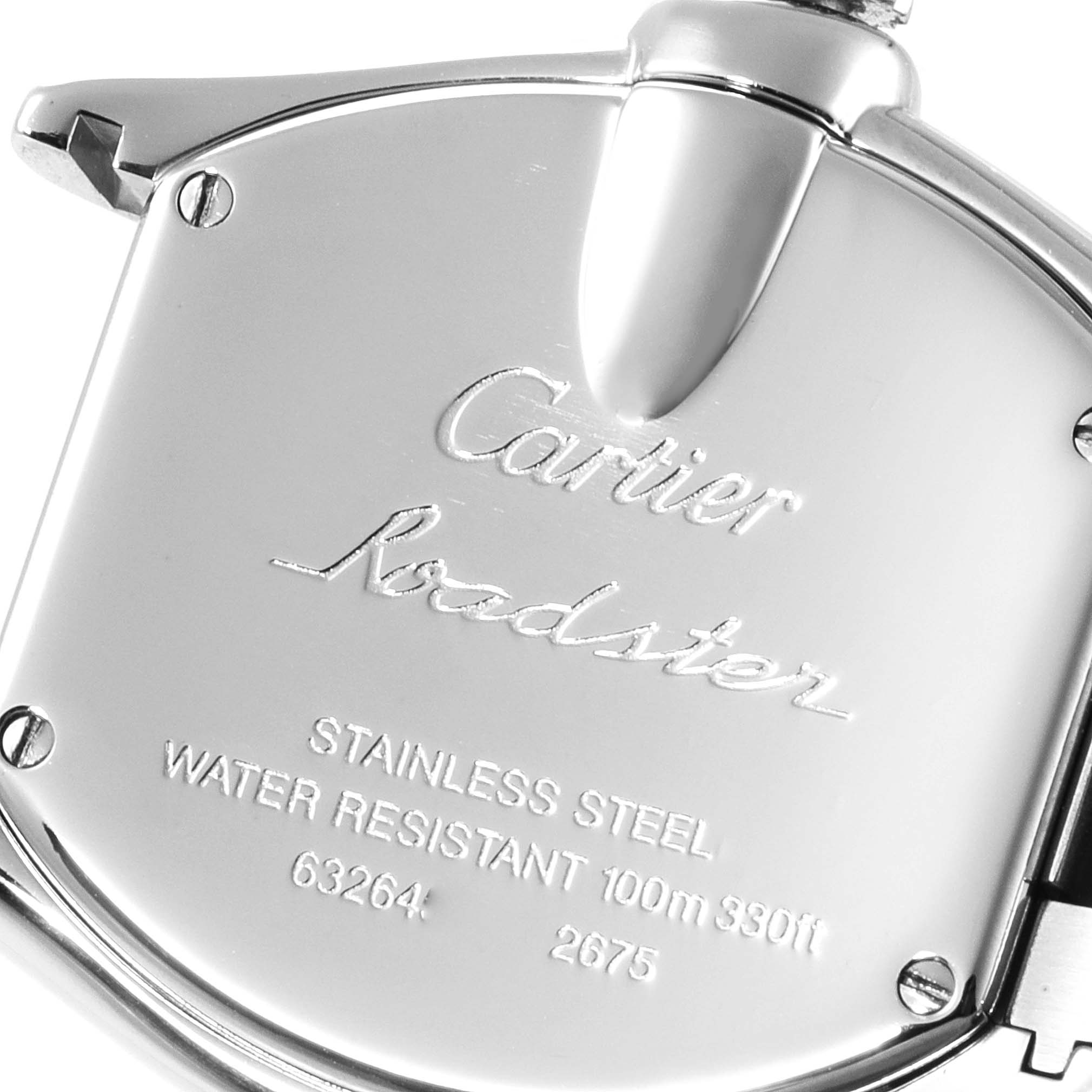 The image shows a close-up of the back case of a Cartier Roadster W62016V3 Women's Stainless Steel Silver Dial W62016V3 Women's Stainless Steel Silver Dial watch, highlighting its details and engravings.