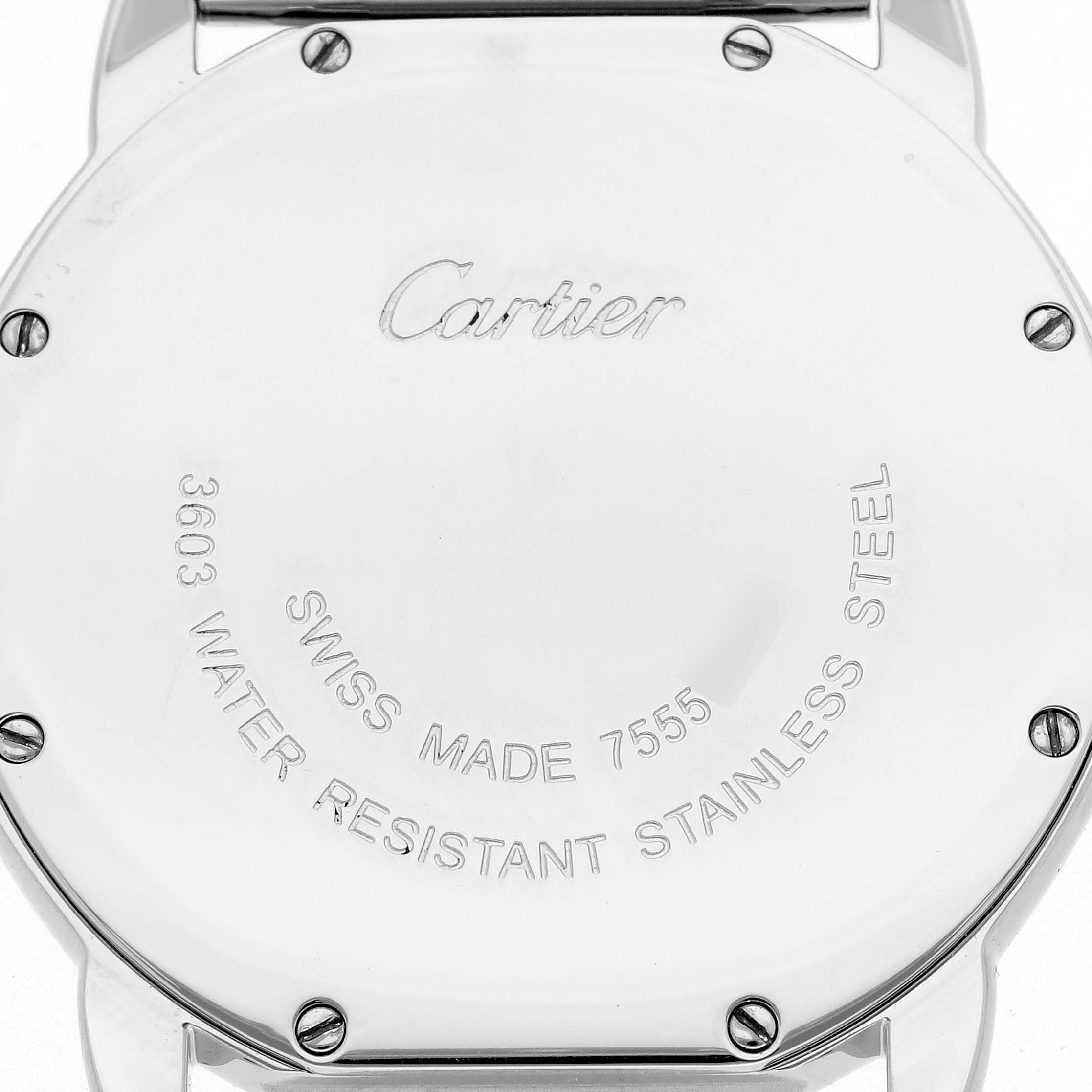 The image shows the back casing of a Cartier Ronde W6701005 Men's Stainless Steel Silver Dial W6701005 Men's Stainless Steel Silver Dial watch, featuring engraved text and screws.