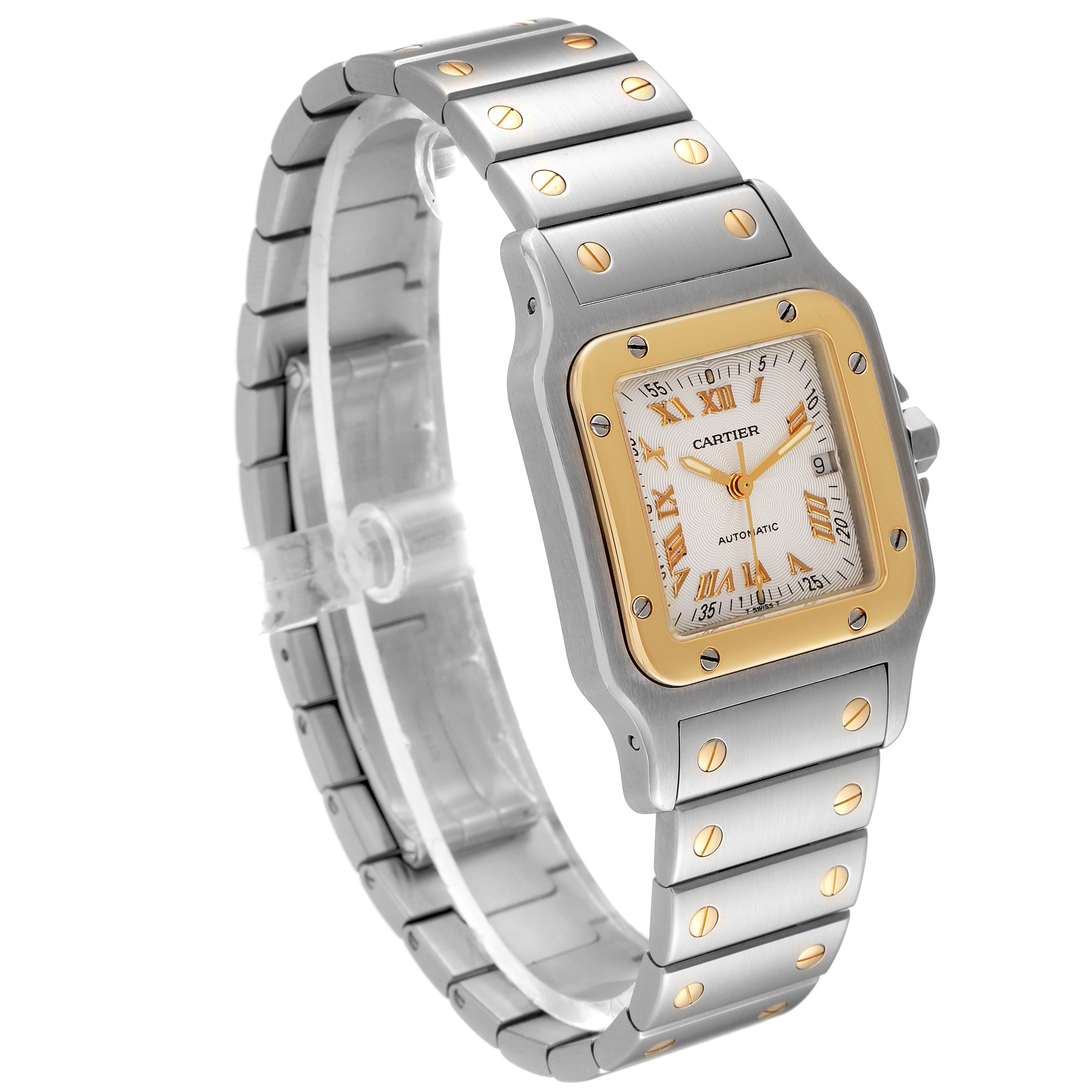 The image shows a three-quarter view of the Cartier Santos W20058C4 Men's Steel and Gold (two tone) Silver Dial W20058C4 Men's Steel and Gold (two tone) Silver Dial watch, highlighting its face, bezel, and bracelet with gold screws.