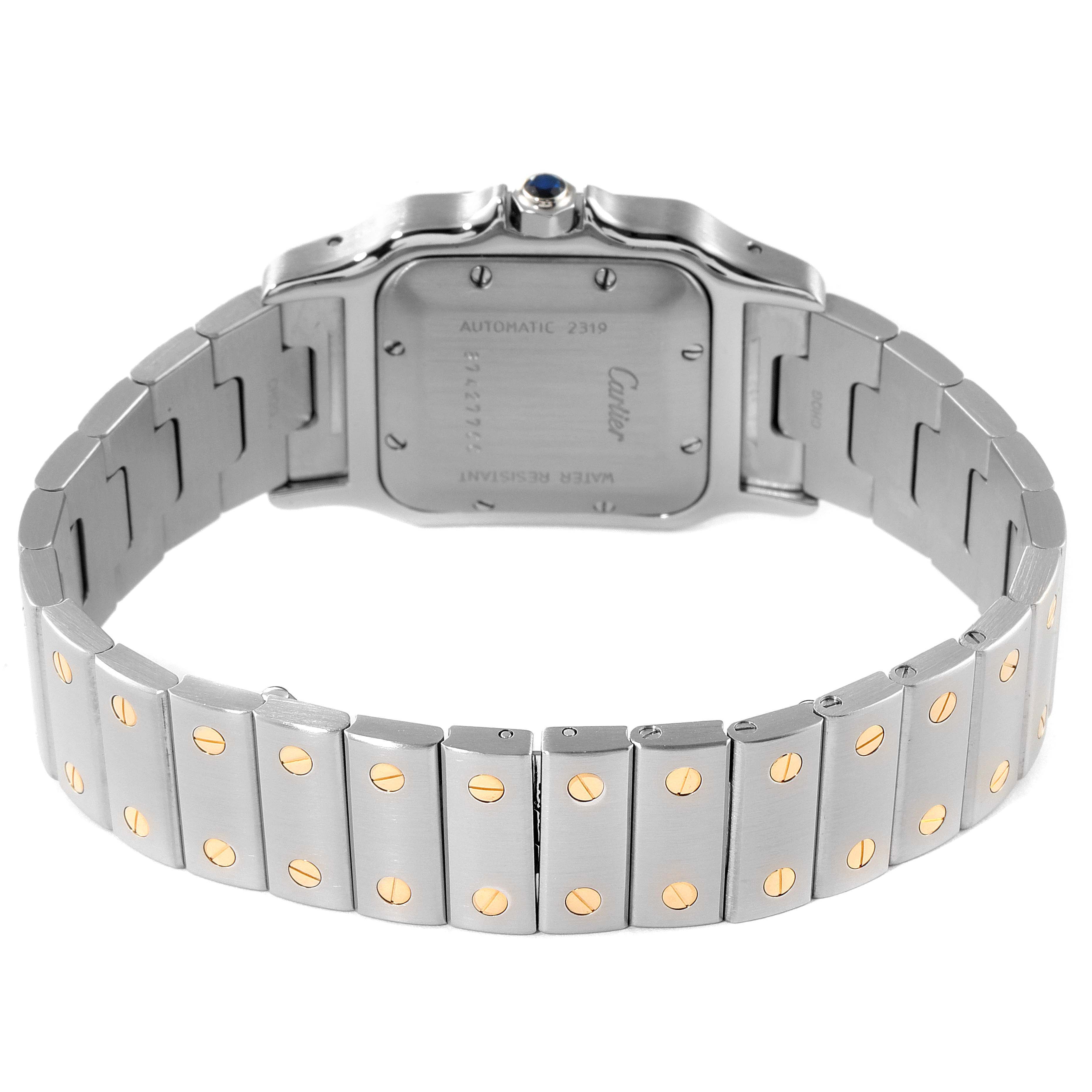 This image shows the back view of the Cartier Santos W20058C4 Men's Steel and Gold (two tone) Silver Dial W20058C4 Men's Steel and Gold (two tone) Silver Dial watch, highlighting the case back and bracelet with gold screws.