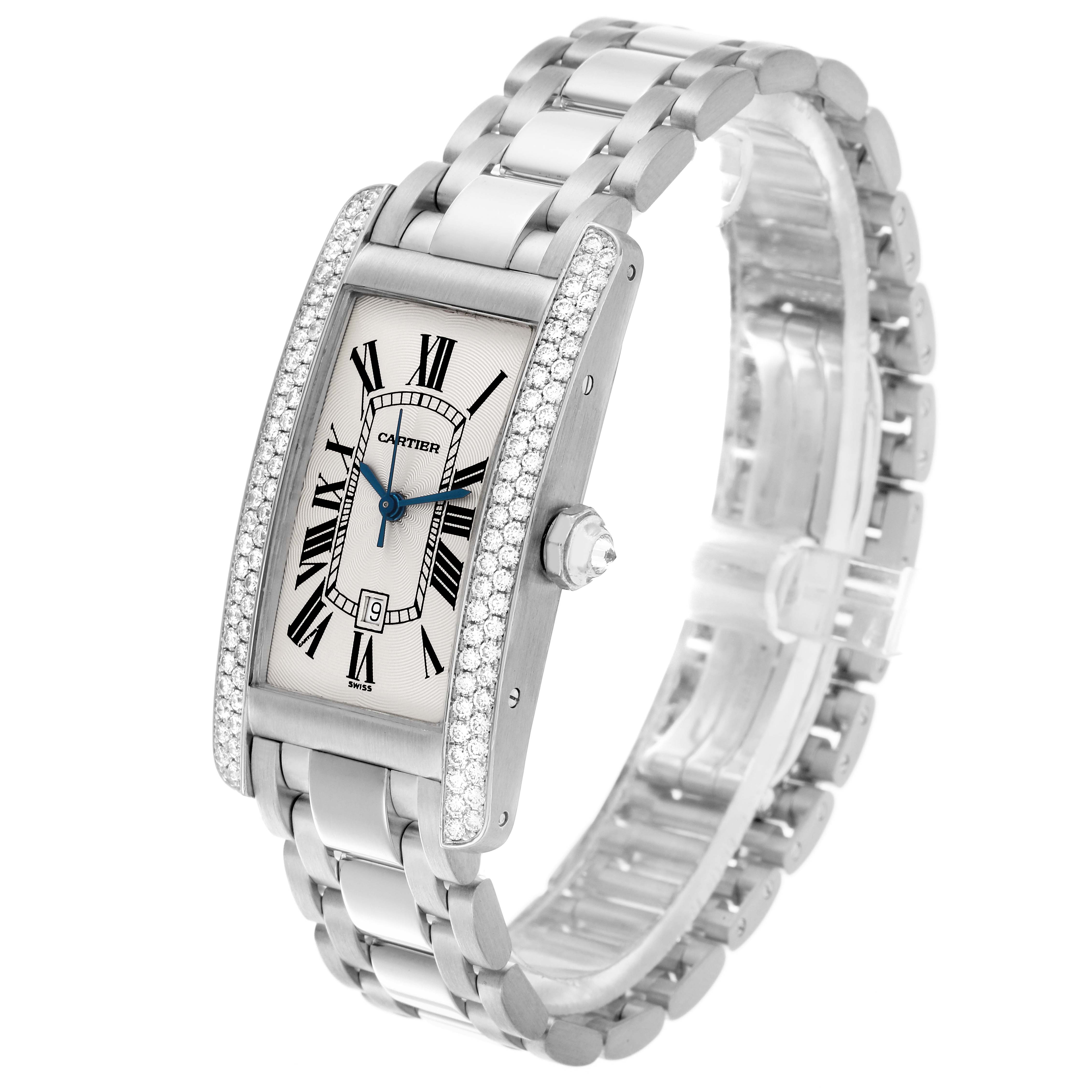 The Cartier Tank Americaine WB702651 Women's White Gold Silver Dial WB702651 Women's White Gold Silver Dial watch is shown at a three-quarter angle, highlighting its face, diamond bezel, and metal bracelet.