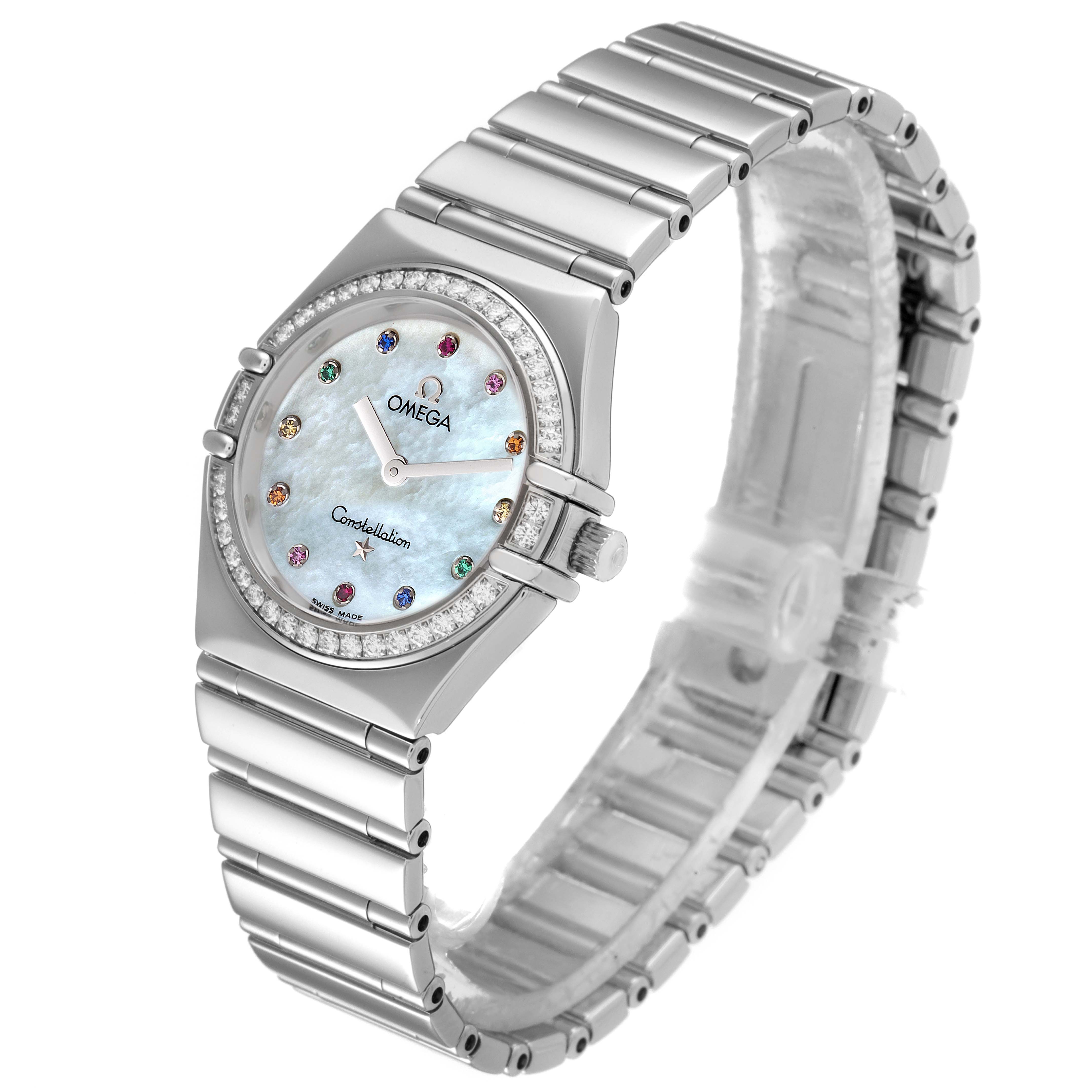 The image shows an angled view of the Omega 1475.79.00 Women's Stainless Steel Mother of Pearl Dial 1475.79.00 Women's Stainless Steel Mother of Pearl Dial Constellation Iris Steel Multi-Stone Ladies Watch model 1475.79.00, highlighting its bracelet and dial.