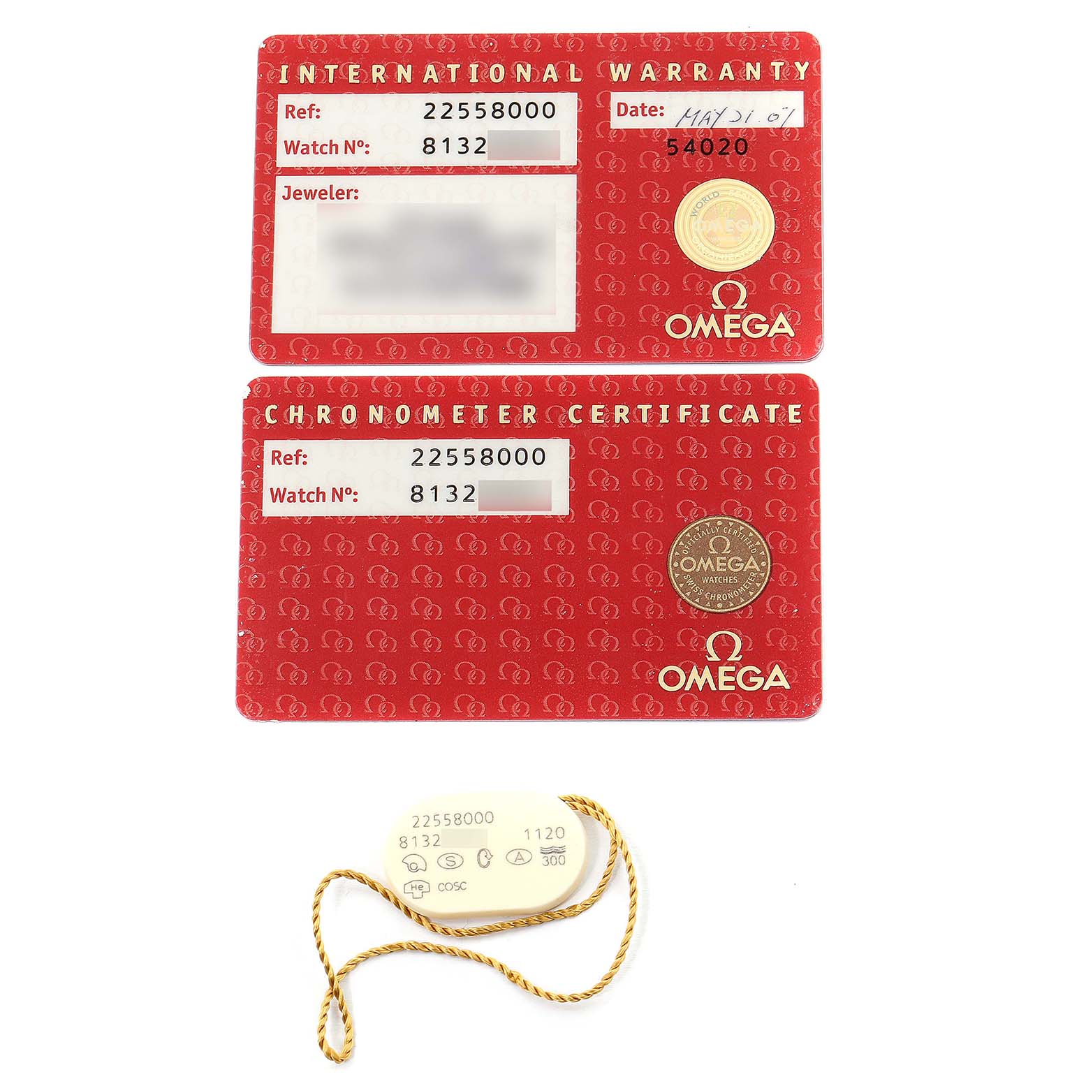 The image shows the international warranty and chronometer certificate cards of the Omega Seamaster 2255.80.00 Men's Stainless Steel Blue Dial 2255.80.00 Men's Stainless Steel Blue Dial watch, along with its tag.